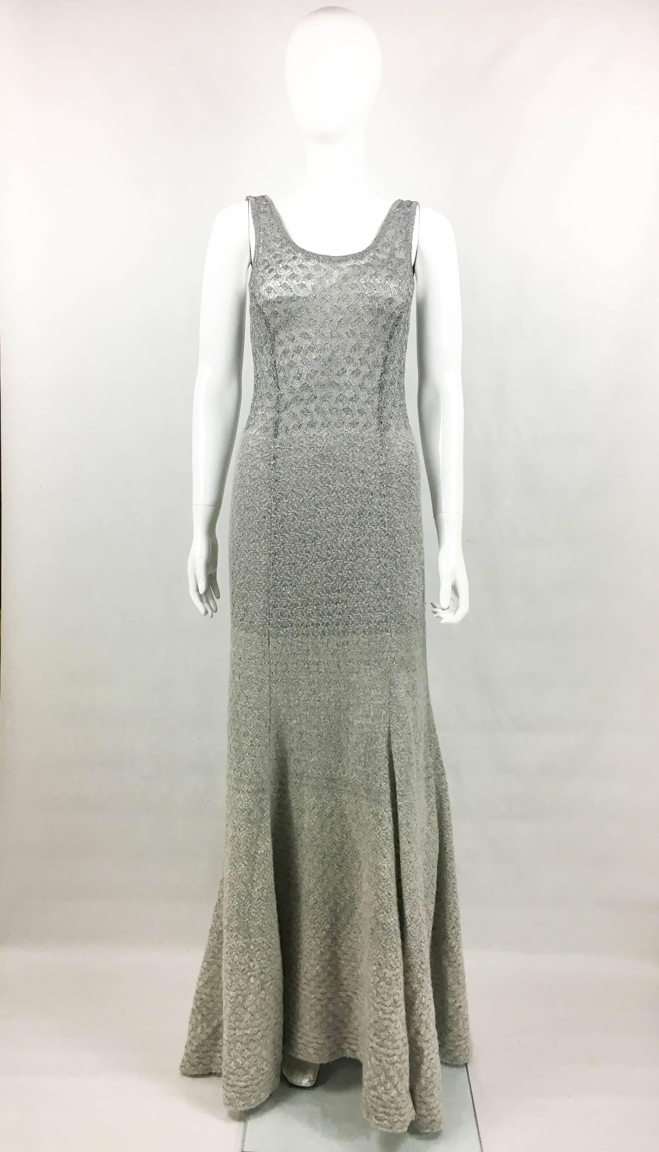 Missoni Grey Cashmere and Lurex Long Dress. This glamorous dress by Missoni is made in a very soft, light grey cashmere and silver lurex. The design of the dress brings a light top and a heavier, more dramatic bottom part. The straps are only in