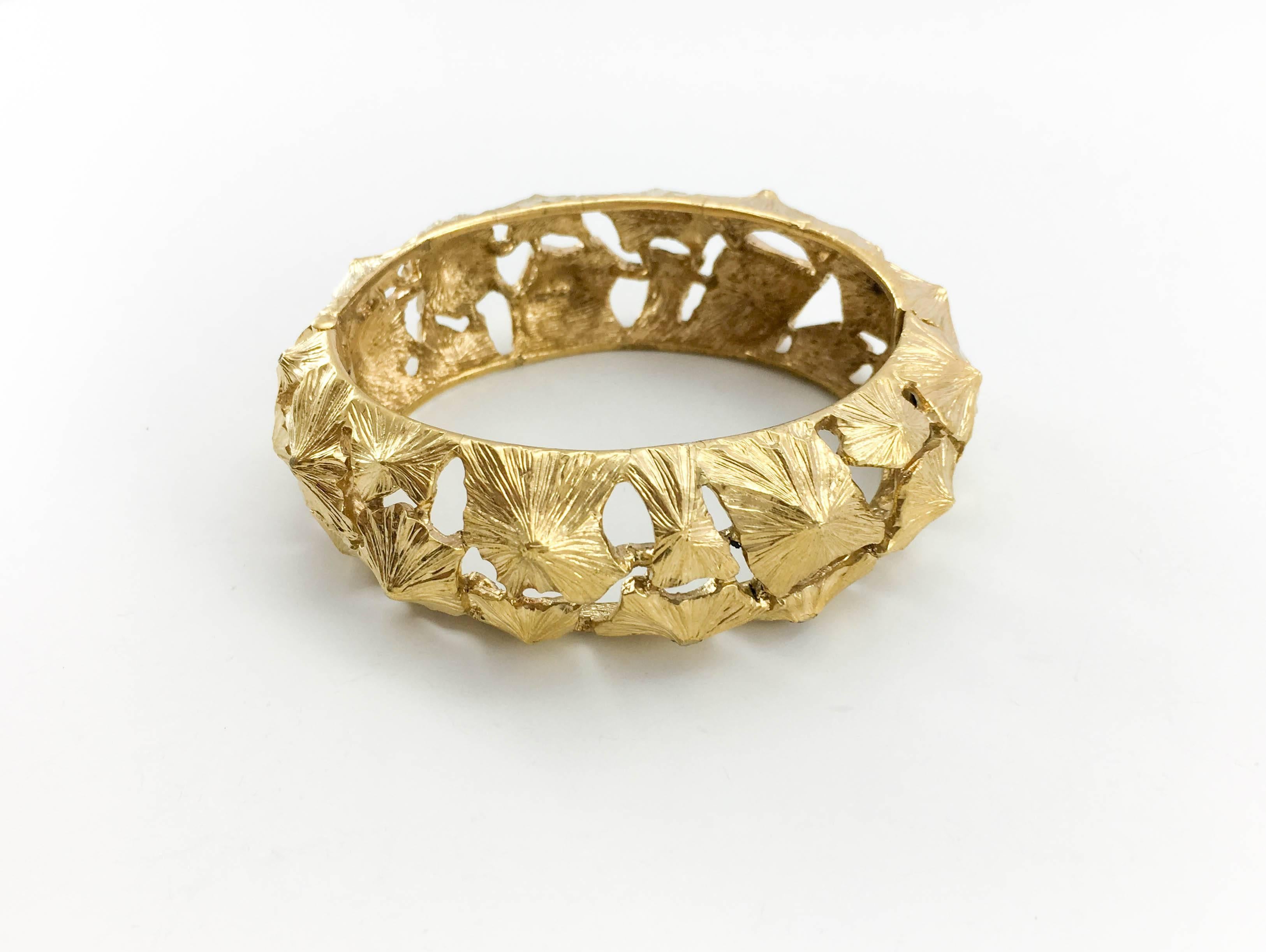 Dazzling Vintage Lanvin Bracelet. This super stylish Lanvin bracelet in gilt metal has a fabulous design. This statement piece is Lanvin signed on the inside. This is a great example of designer costume jewellery that will add a bit of flare to any