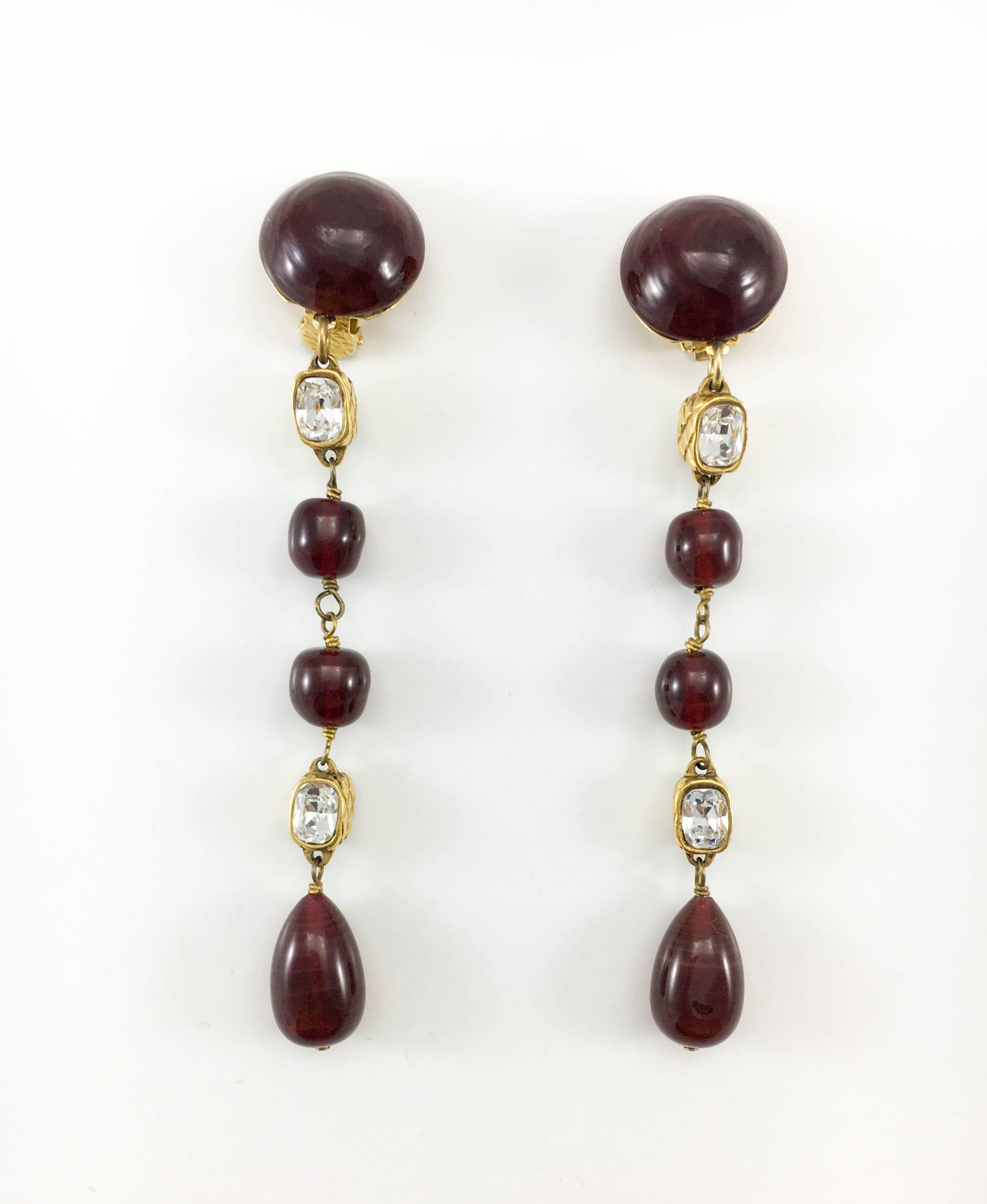 Vintage Chanel Red Gripoix and Crystal Beads Long Clip-On Dangling Earrings. These beautiful earrings were designed by the legendary jewellery designer Victoire de Castellane in 1986, her first year at Chanel. Made in red gripoix beads, rhinestones