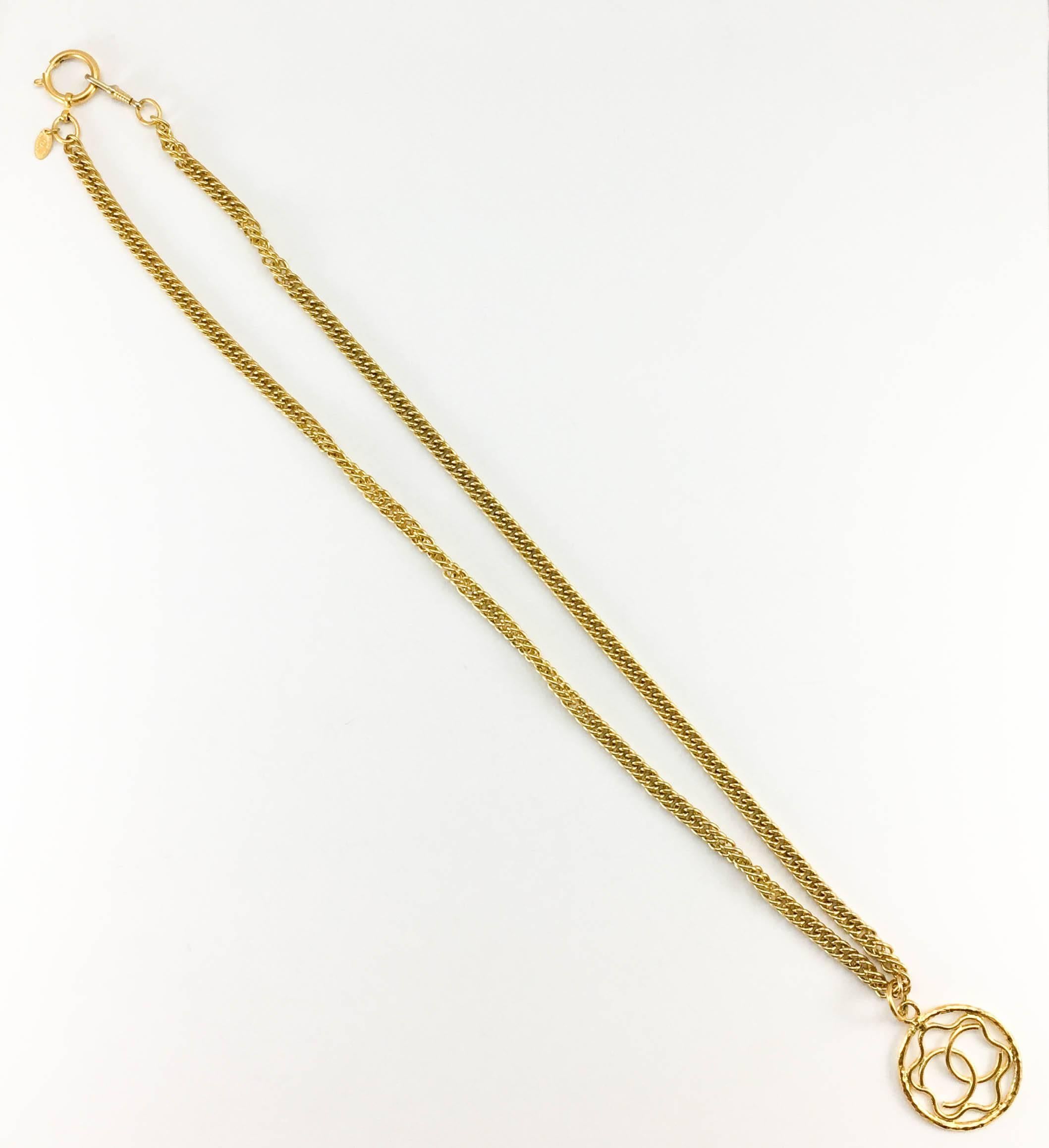 1980s Chanel Gilt Logo Medallion Pendant Long Chain Necklace For Sale 2