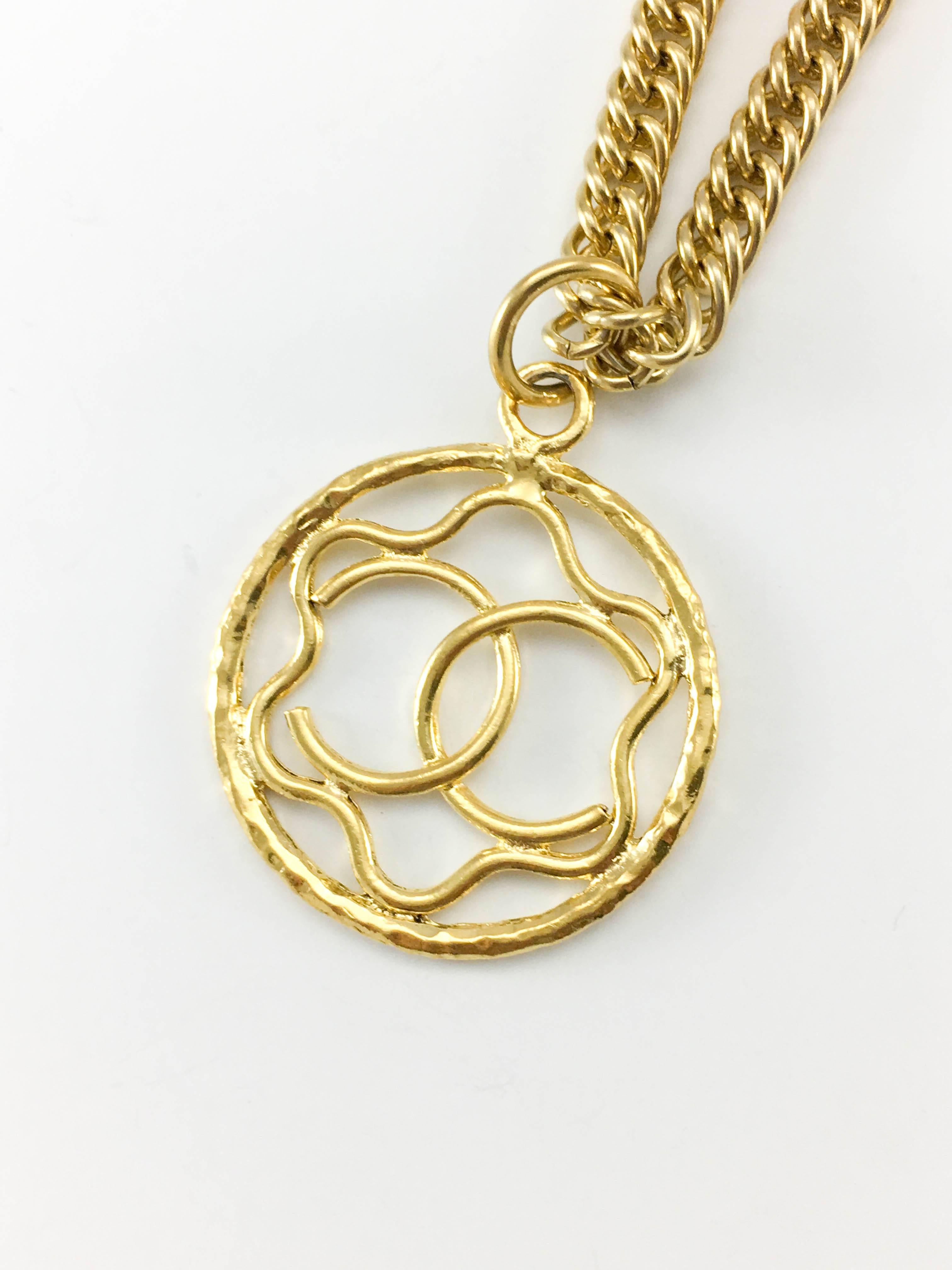 1980s Chanel Gilt Logo Medallion Pendant Long Chain Necklace For Sale 3