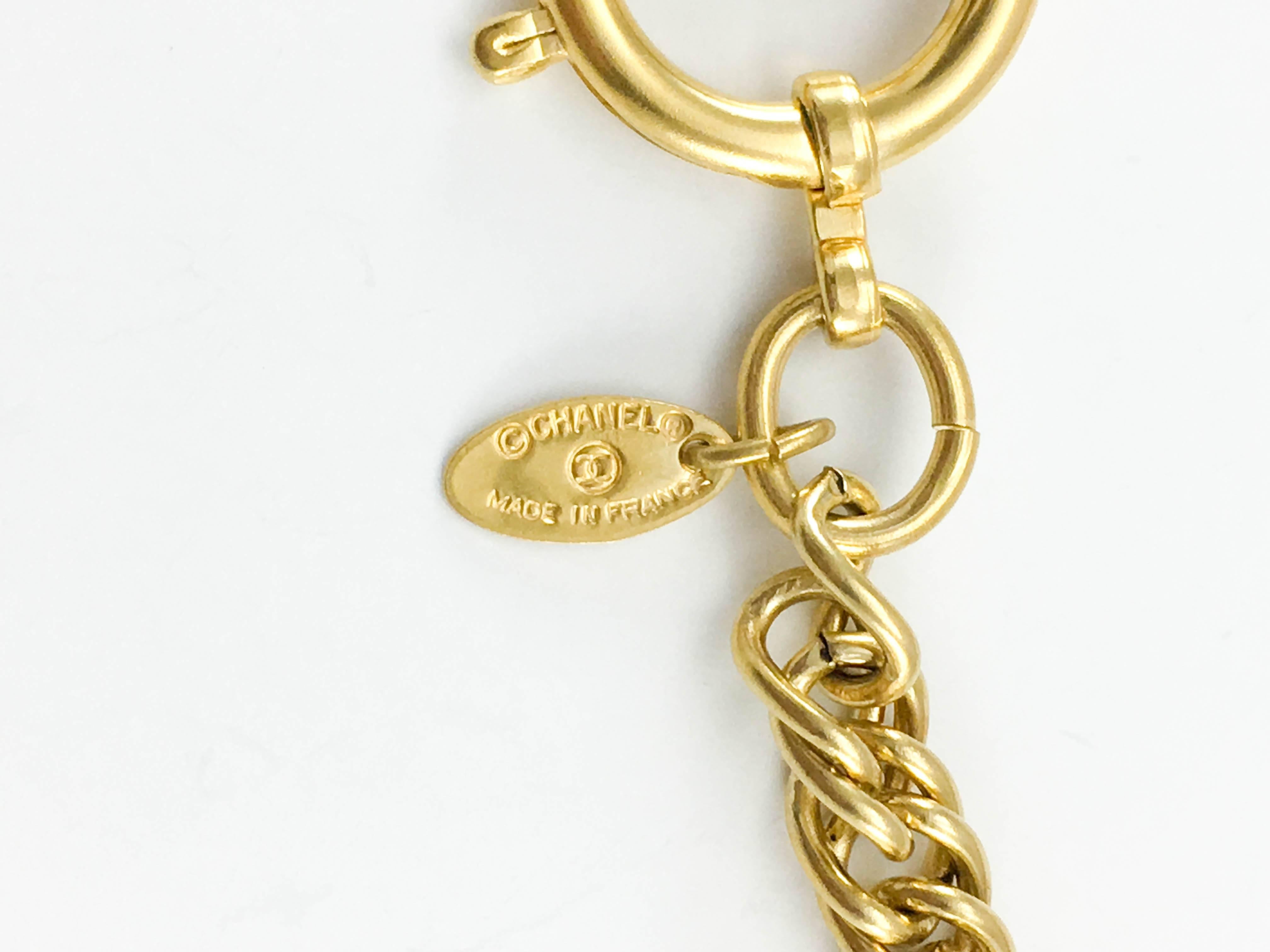 1980s Chanel Gilt Logo Medallion Pendant Long Chain Necklace For Sale 4