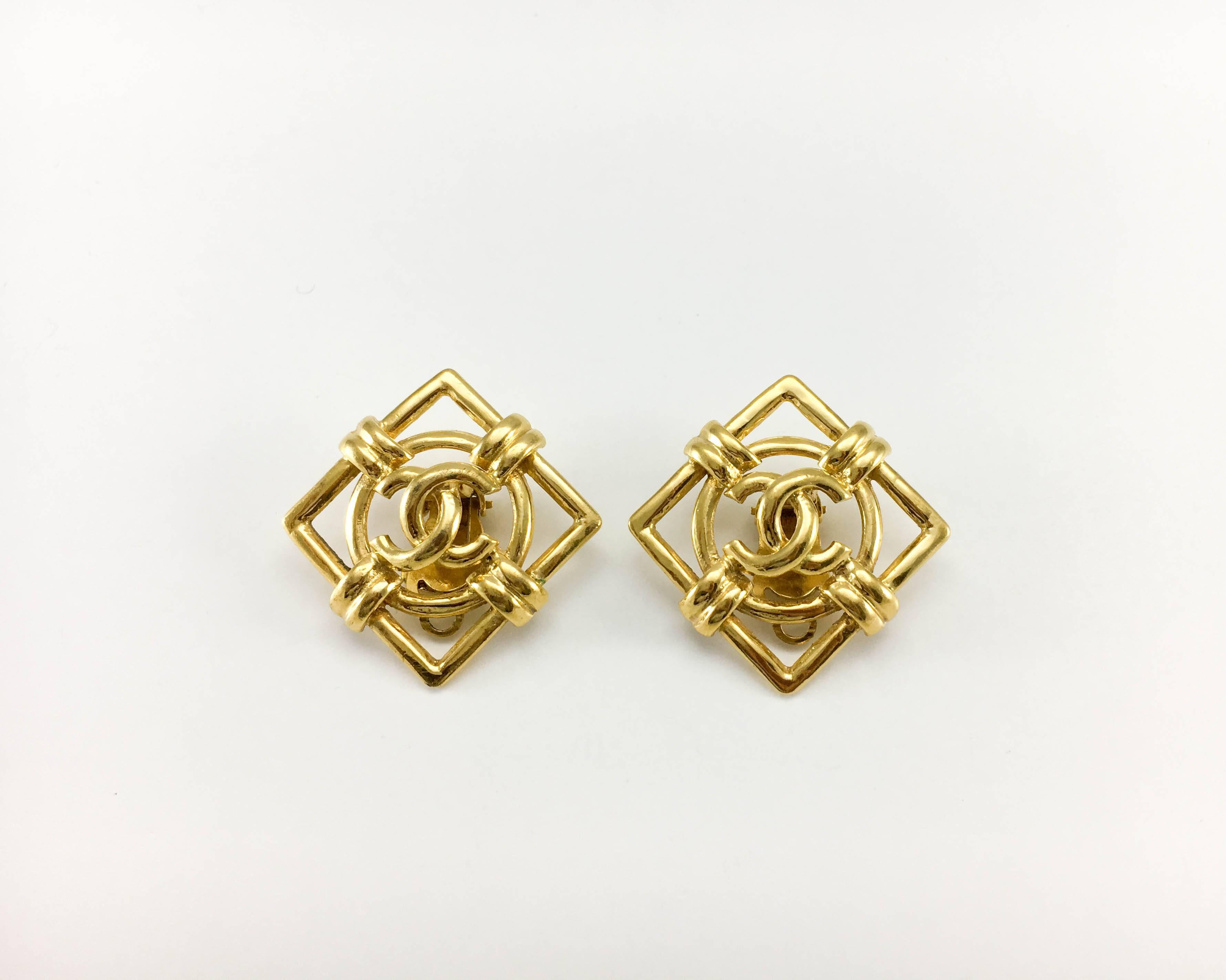 Vintage Chanel Gilt Lozenge Logo Clip-On Earrings. These stylish earrings by Chanel were created by iconic jewellery designer Victoire de Castellane for the 1992 collection. Made in gilt metal, the design plays with geometric shapes, bringing the