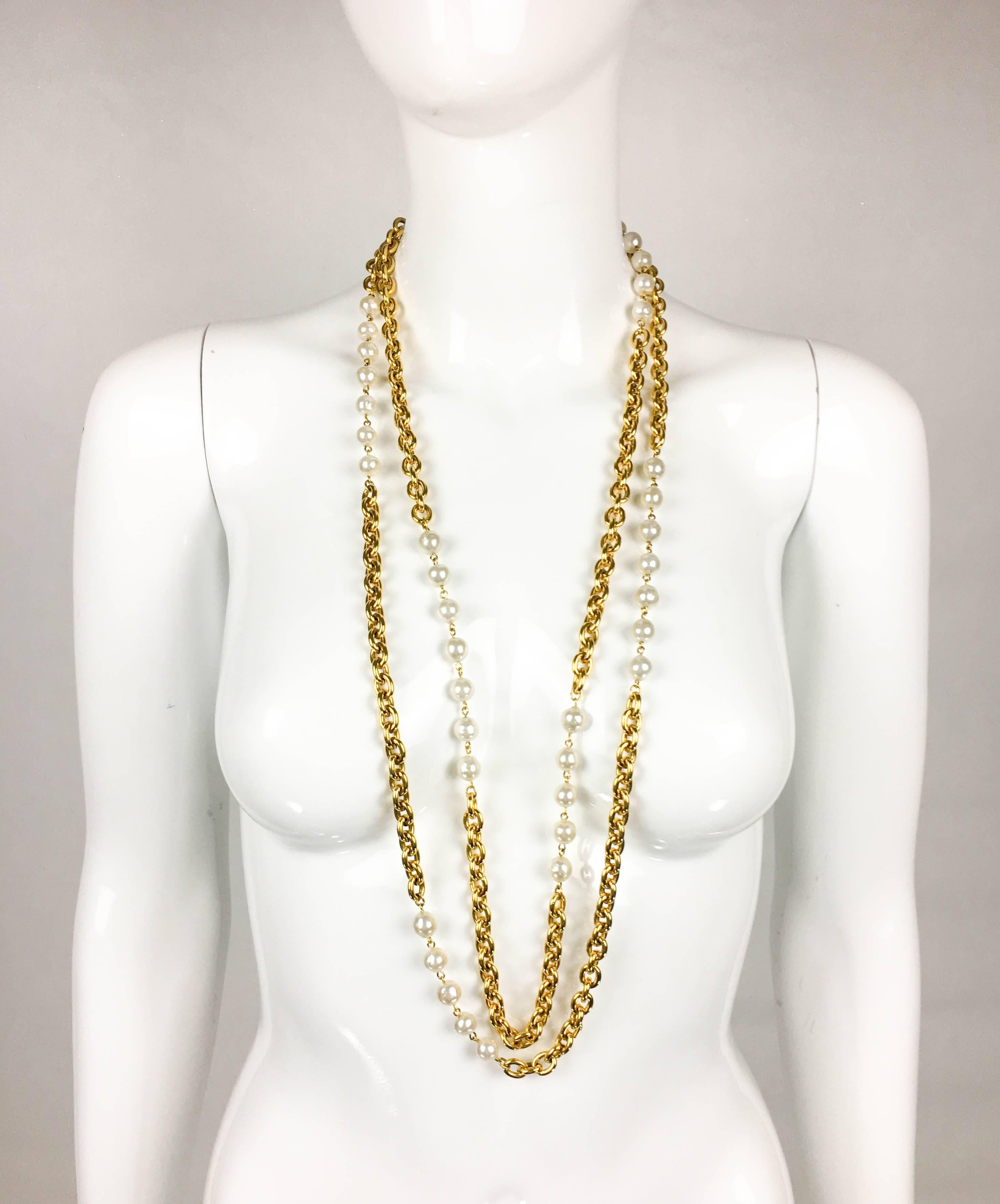 Vintage Chanel Double-Strand Pearl and Gilt Chain Necklace. This beautiful necklace by Chanel dates back from 1984. A creation from Karl Lagerfeld’s first year at the realm of Chanel, identical pieces to it appeared several times on the runway for