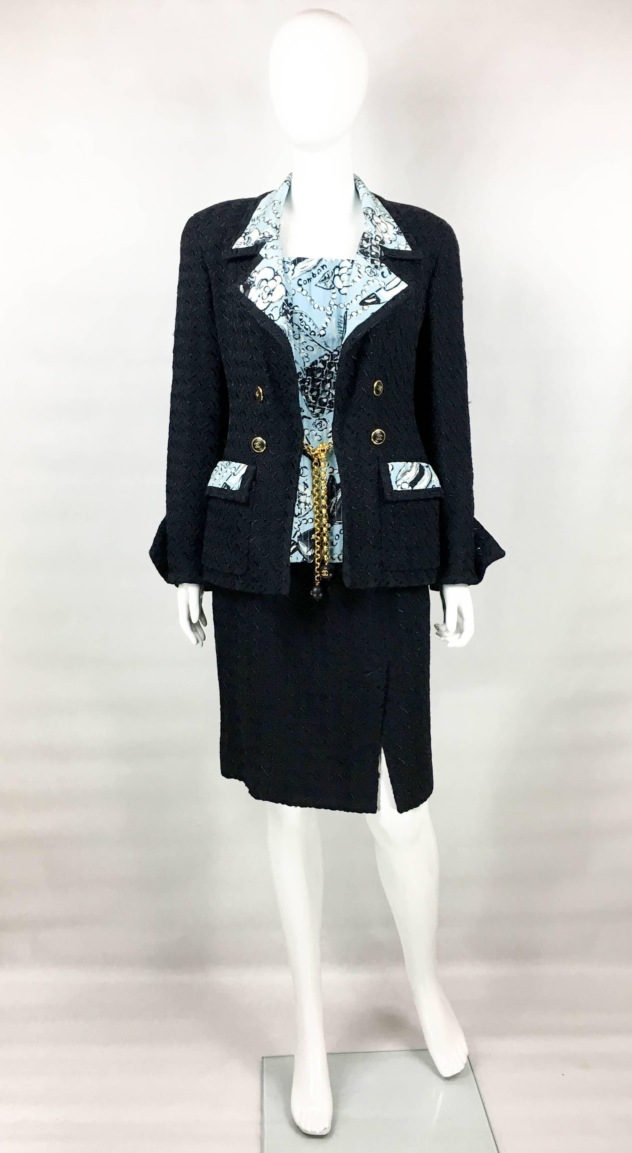 Vintage Chanel Black Wool Boucle 3-Piece Ensemble. This gorgeous ensemble by Chanel, comprising of a jacket, skirt and bustier-like bodice, was created for the 1993 Spring / Summer Collection. The black jacket is made in patterned wool boucle and it