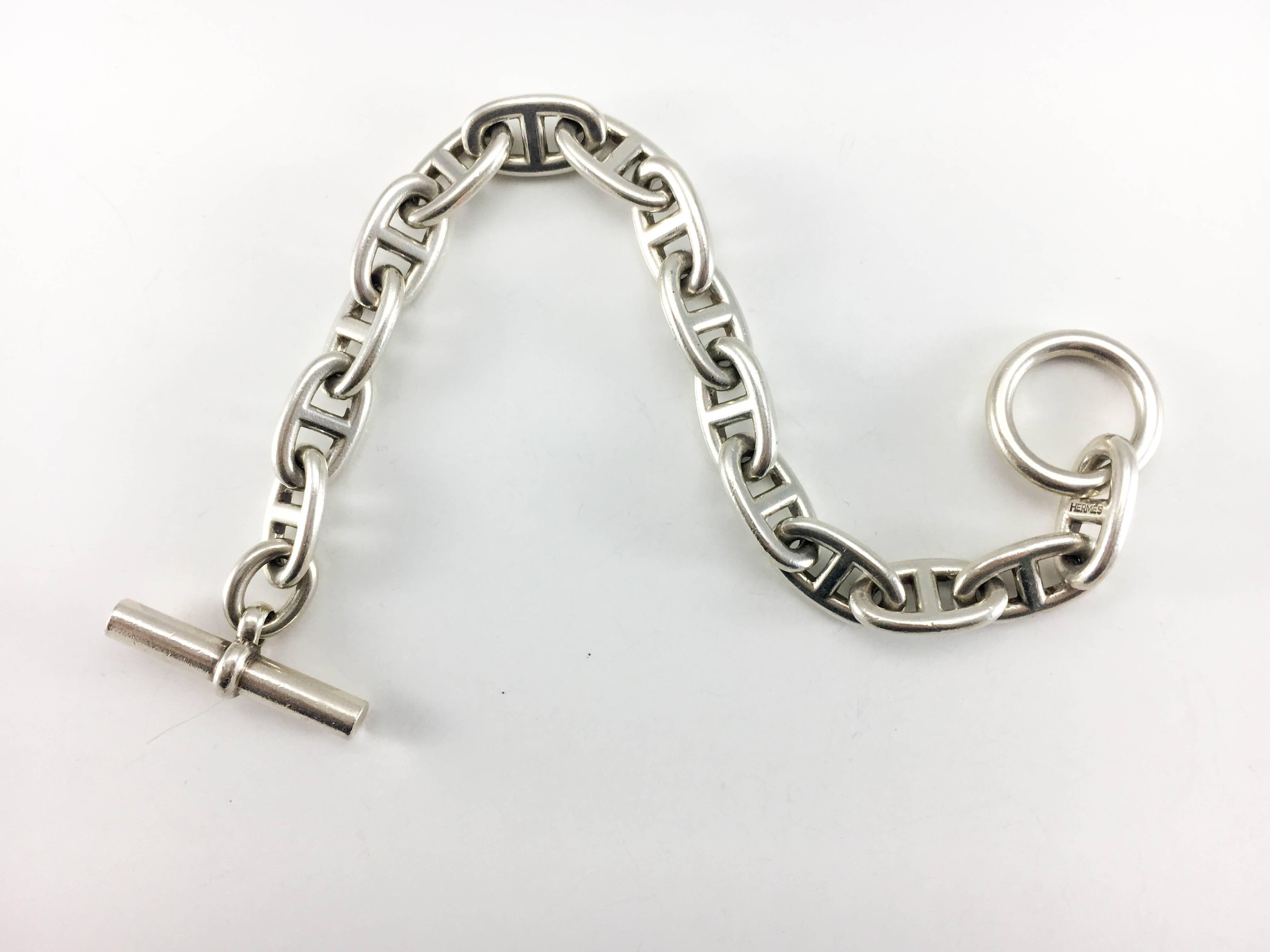 Hermes Chaîne d'Ancre Silver Bracelet. One of the most iconic designs by Hermes, this Chaîne d'Ancre bracelet is made in solid sterling silver. The size is TGM. Hermes signed and fully hallmarked. Toggle clasp. A very stylish and classic piece by