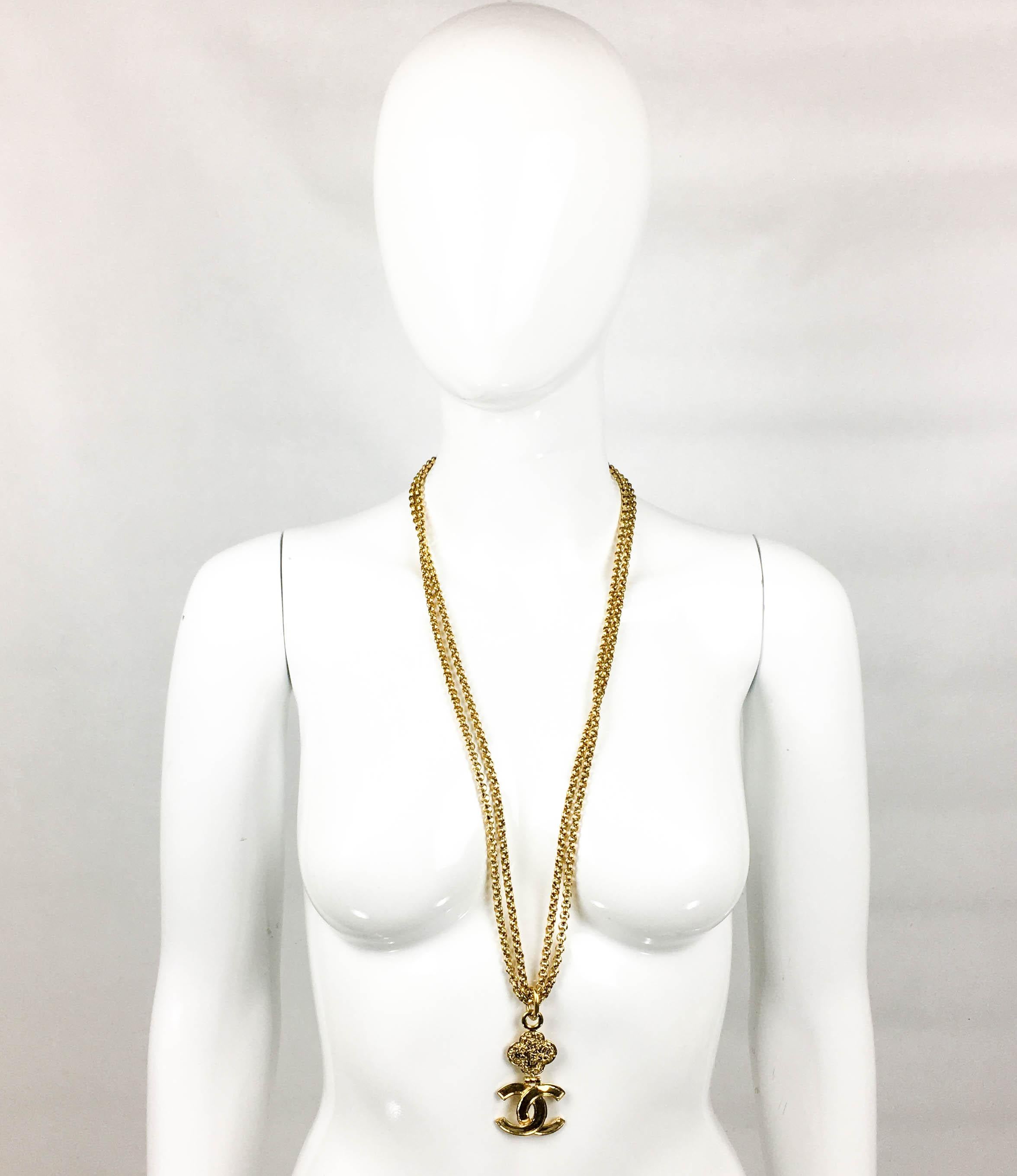 Vintage Chanel Gilt Logo Pendant Necklace. This gorgeous Chanel necklace was created for the 1995 Autumn / Winter Collection. Comprising of a long double chain and the iconic ‘CC’ logo as a pendant, it can also be worn doubled up. Chanel signed on