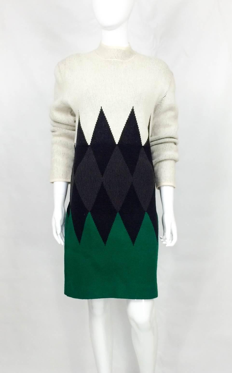 Sleek Vintage Jean Paul Gaultier Wool Dress. This is a stylish long-sleeve dress in beige, black, grey and green with a mock turtle neck. The area with the grey lozenges is slightly cinched in, giving it a little bit of structure and creating a