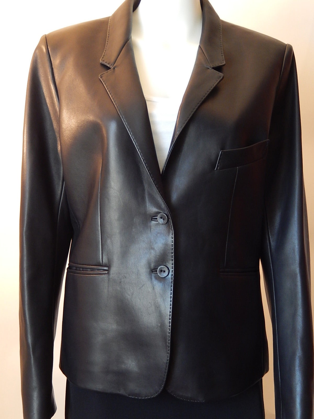 Beautiful and always in style Hermes Jacket.
Made from Lambskin leather and very soft.
Two button closure
One breast pocket and two hips pockets
Fully lined in 100% silk
Size 46
Bust:  42