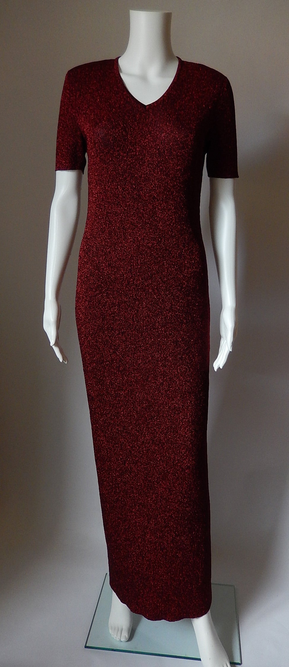 Chanel red metallic v-neck short sleeeve Maxi Dress
No year or material label inside but feels like a stretchy rayon blend
All measurements are taken flat
Bust:  35