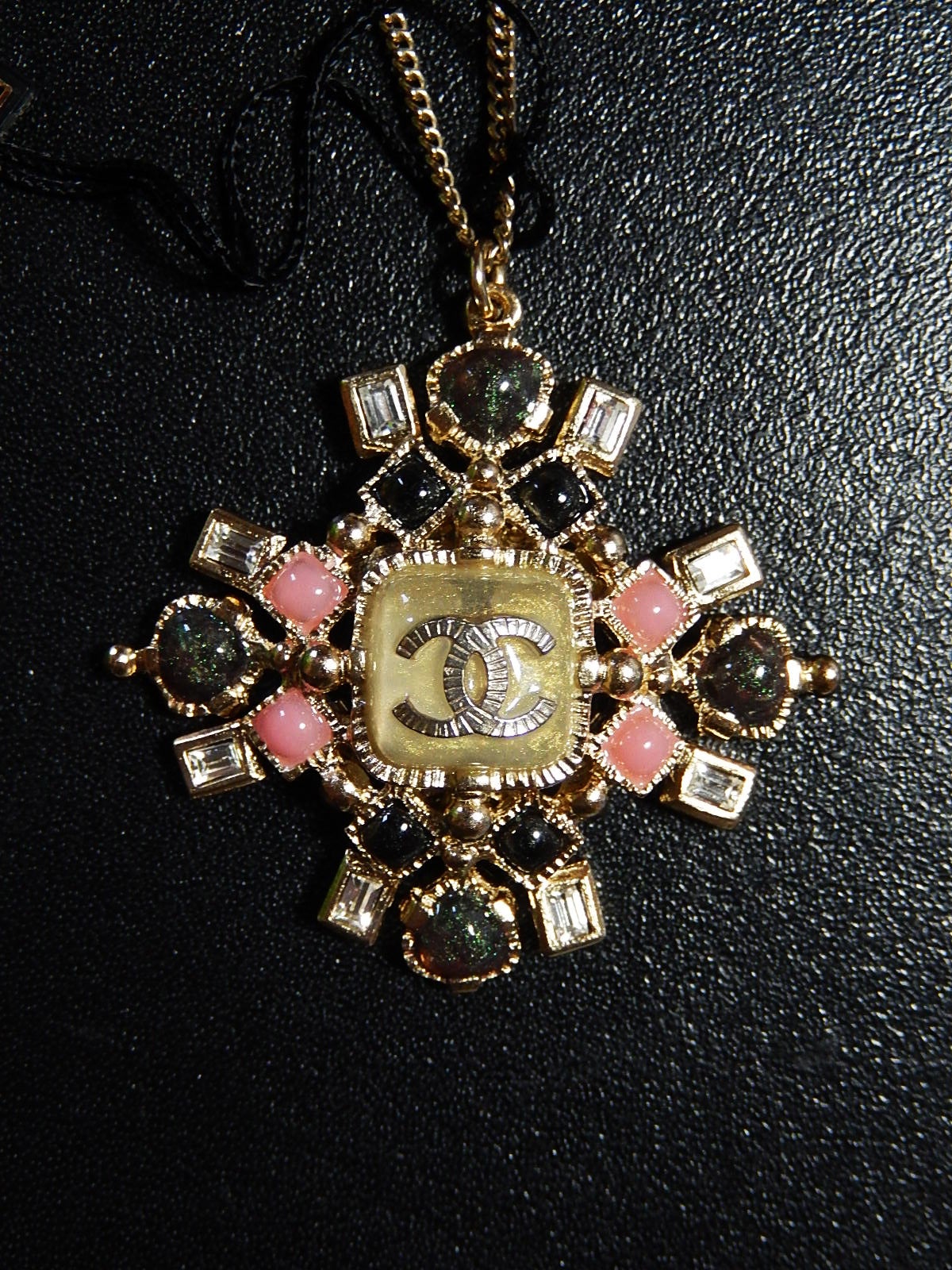 Chanel Gold Chain with pearl multi-stone pendant with middle CC
Measures 13.25