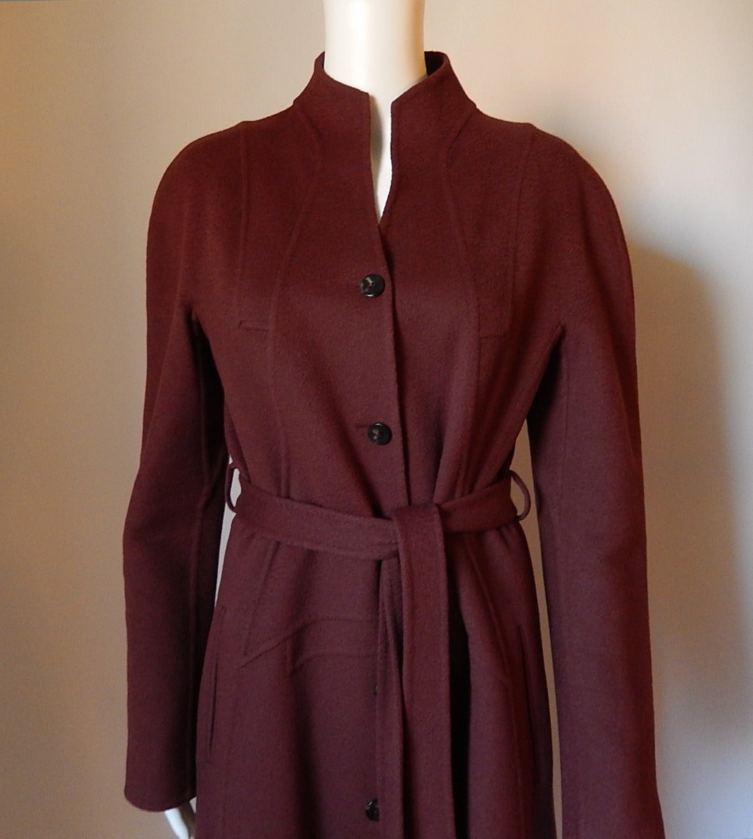 Chado Ralph Rucci double faced cashmere coat
Buttons down the front
Side slit pockets
All hand sewn with his seaming details and stitching details
Belt included
Color is Maroon
Bust:  39