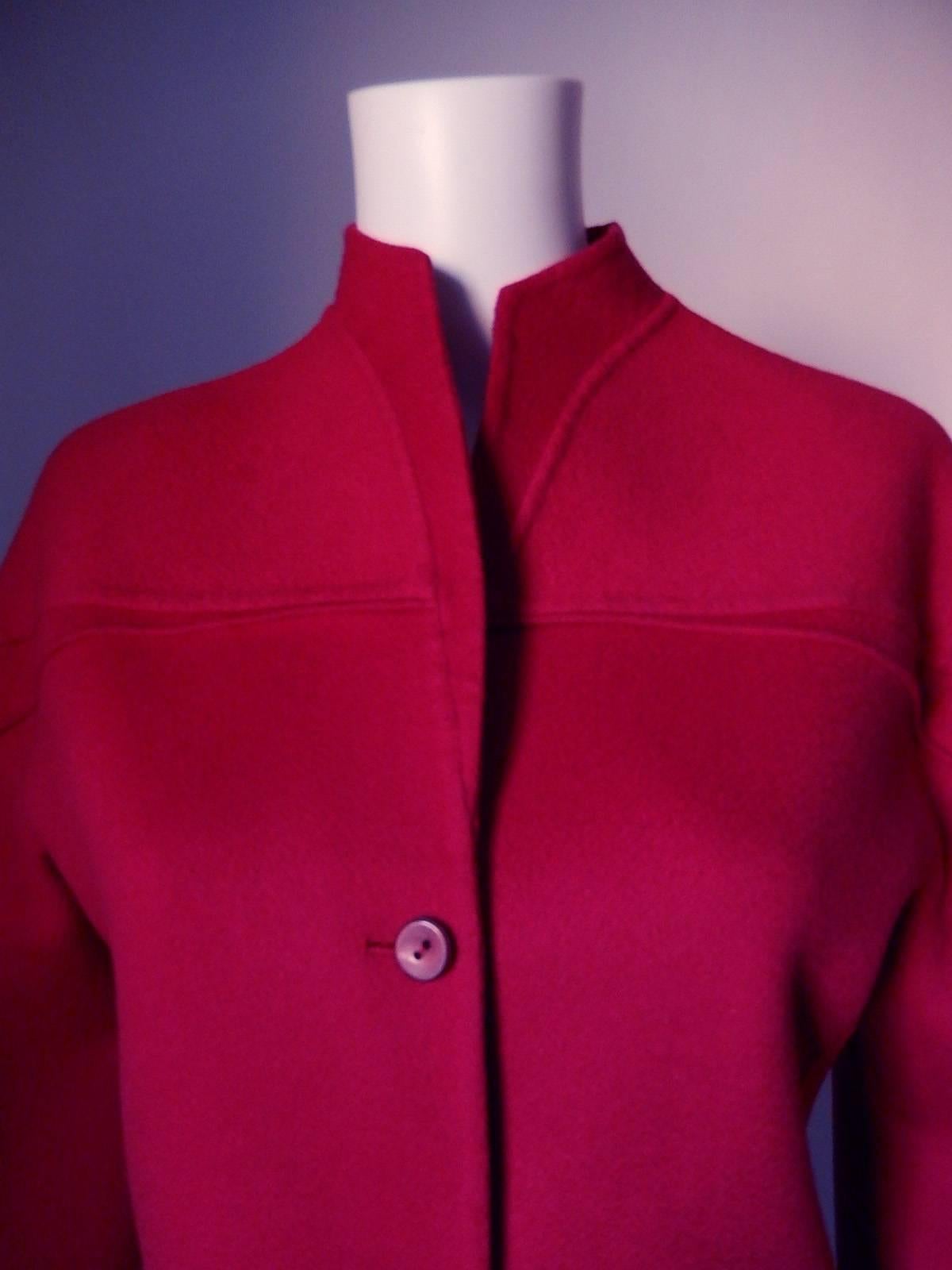 Chado Ralph Rucci 100% Cashmere Jacket
Color is  red/raspberry
Three dimensional seaming details
Sloped shoulder line

Bust:  37