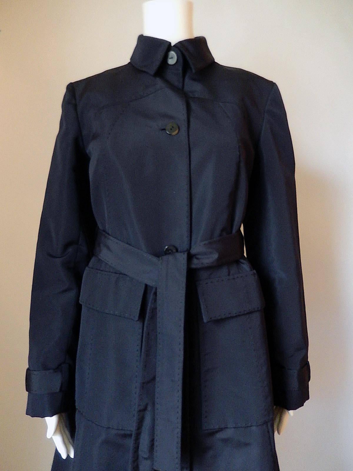 This is a Chado Ralph Rucci Navy 100% silk coat that is fully lined.
Hand stitching details throughout and too numerous to list!
Perfect condition.  Looks unworn
This will fit a larger size, so please have a look at the measurements.
Bust: 