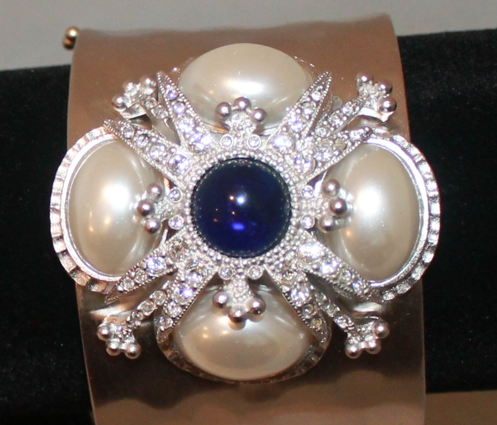 St. John Hammered Silver Pearl Brooch Cuff. This cuff is in excellent condition.

Width- 1.75