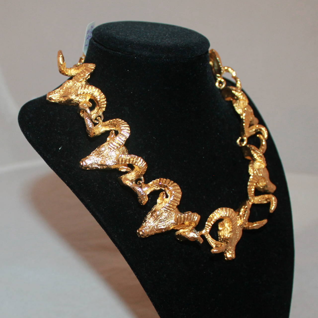 Judith Mullen Vintage Golden Ram Necklace - circa 1980s. This necklace is in excellent condition.

Length- 15