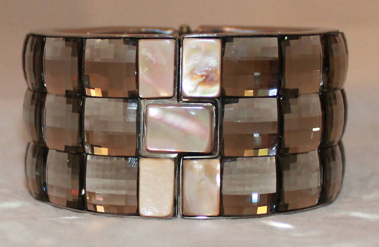 Pono Iridescent Stone & Mother of Pearl Cuff. This cuff is in excellent condition.

Width- 1.5