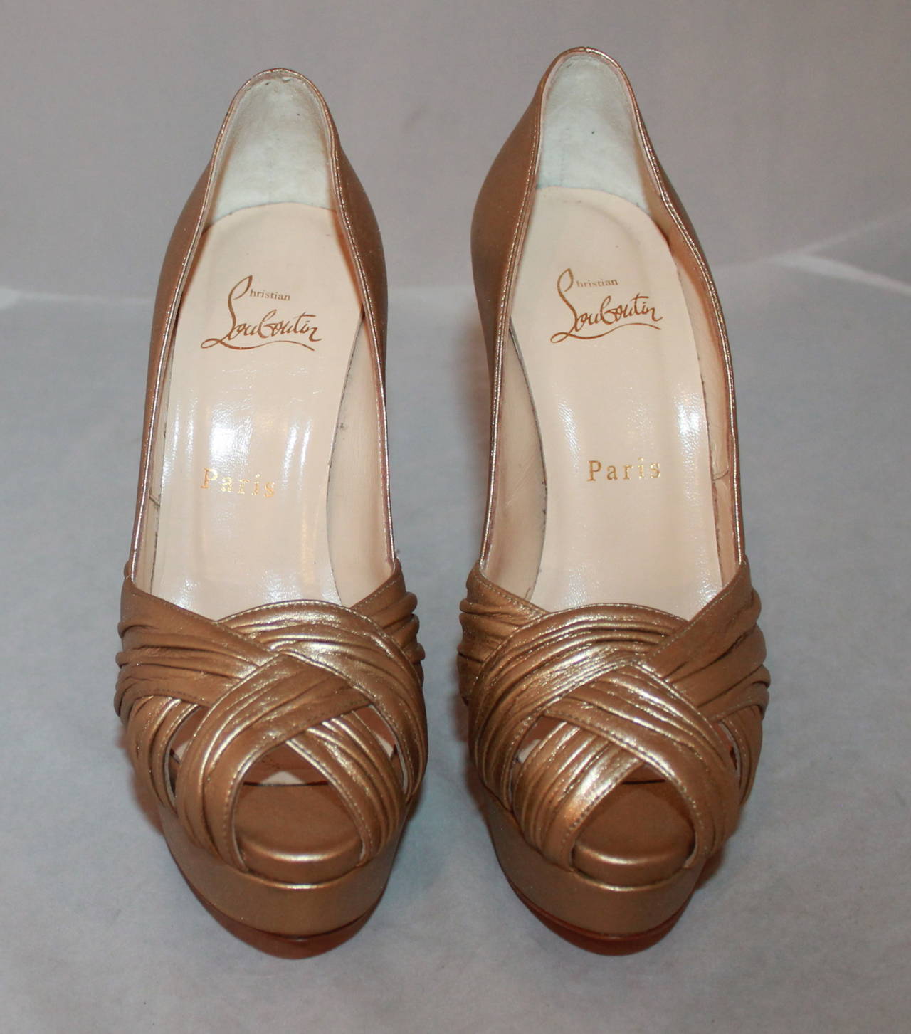 Christian Louboutin Golden Platform Heels - 36. These shoes are in excellent condition with nearly no wear on the bottom.