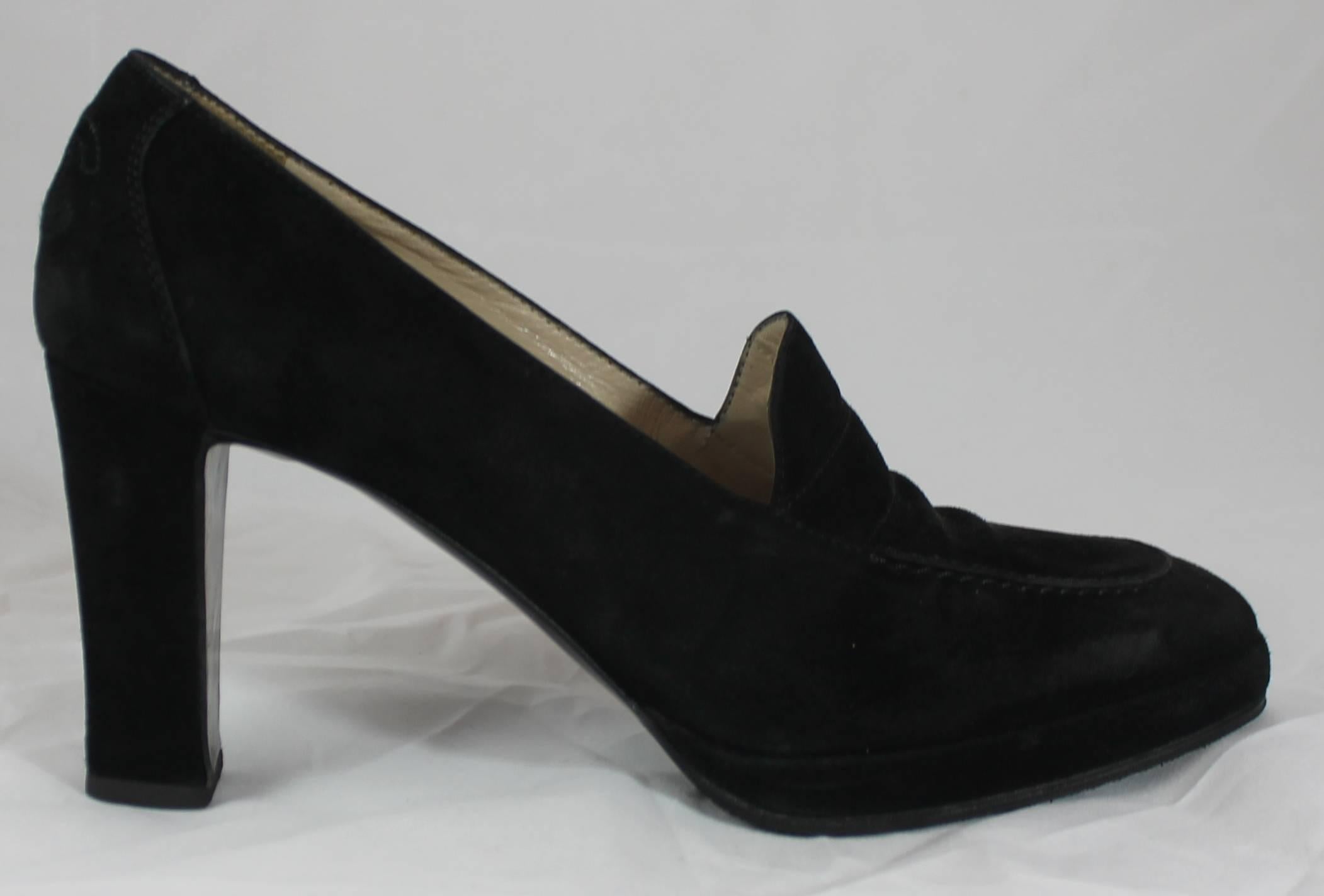 Chanel Black Suede Loafer Style Pumps - 36.5. These loafers are black suede with a vintage feel to them. They are in good condition with some discoloration on the suede.

Measurements:
Heel: 3.25