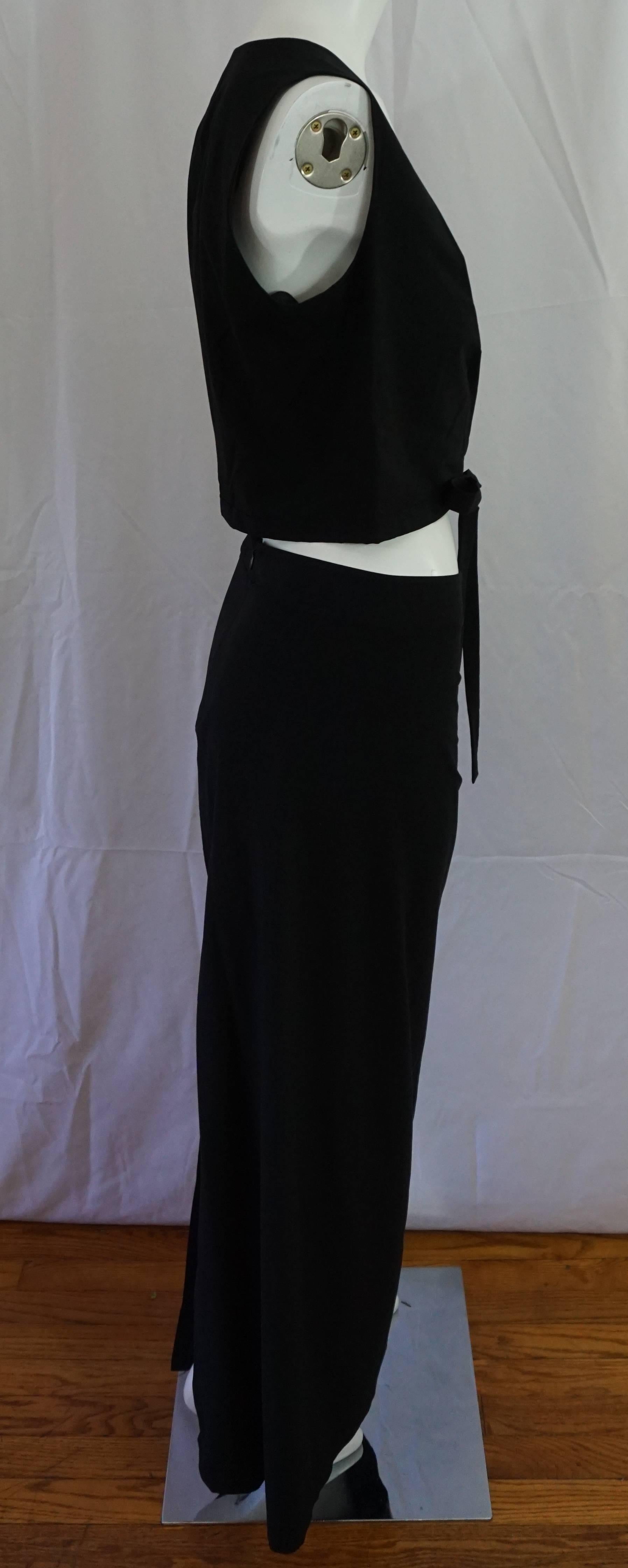 Chanel Black 2 Piece top and maxi skirt - 42 - 99C  This beautiful and unique ensemble is made of viscose/nylon/spandex blend. This vintage set has a sleeveless crop top w/ a V-neck, front pleats and a tie at the waist. The Maxi skirt has a front