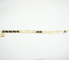 Chanel Black Leather and Goldtone "Coco Chanel" Belt with Hanging CC-circa 92