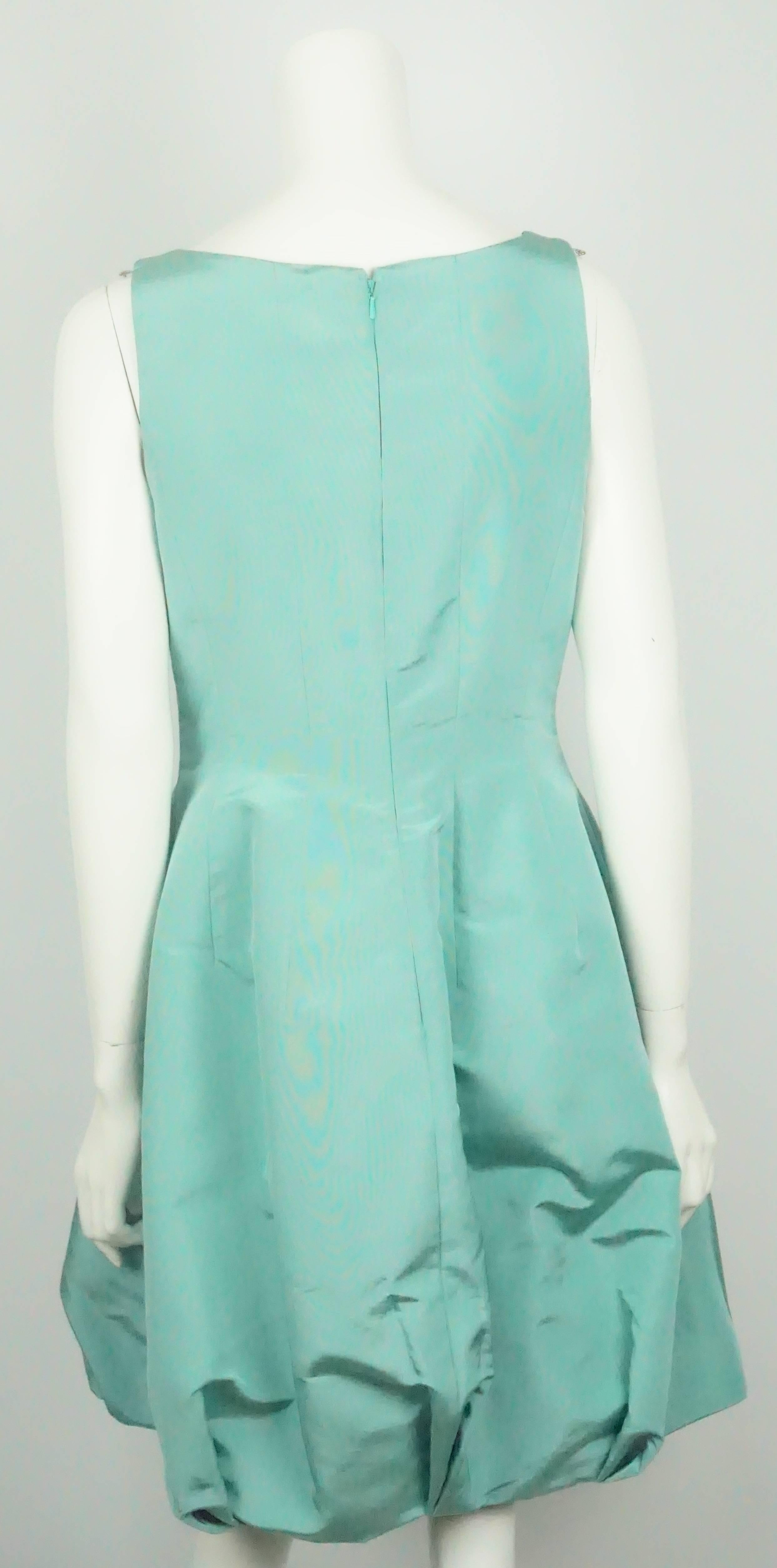 Oscar de la Renta Teal Silk Taffeta Sleeveless Poof Dress - 8  This very beautiful sleeveless Oscar creation is in excellent condition. The dress is fitted all the way to the waist and then flares out and poofs as the fabric goes all the way under.