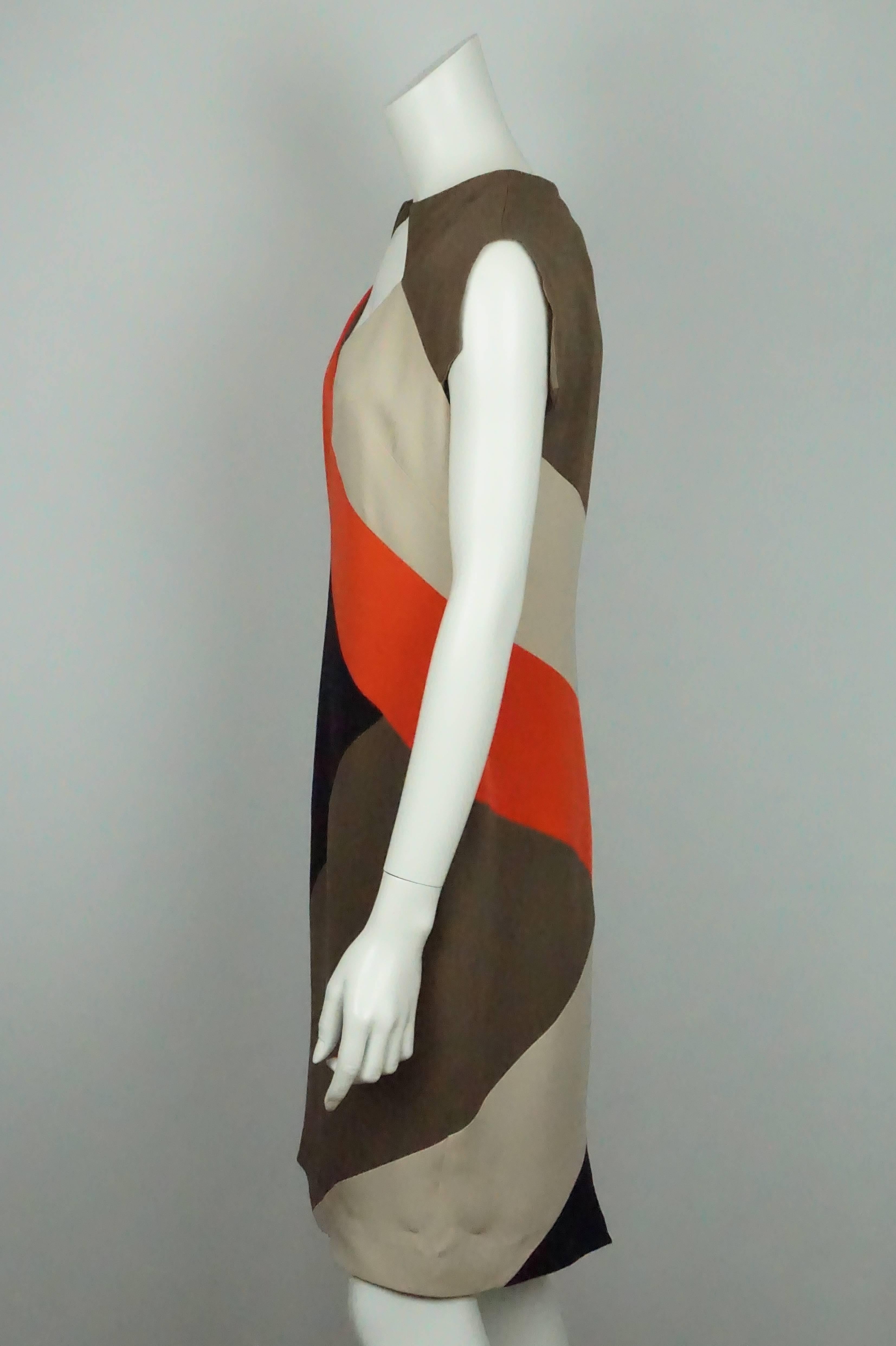 Lela Rose Brown/Orange/Beige S/S Silk Dress - 8  This beautiful dress is in good condition. There is a geometric pattern throughout the dress that contains brown, orange, and beige colors. It is fully lined in silk. There is a small kick pleat on