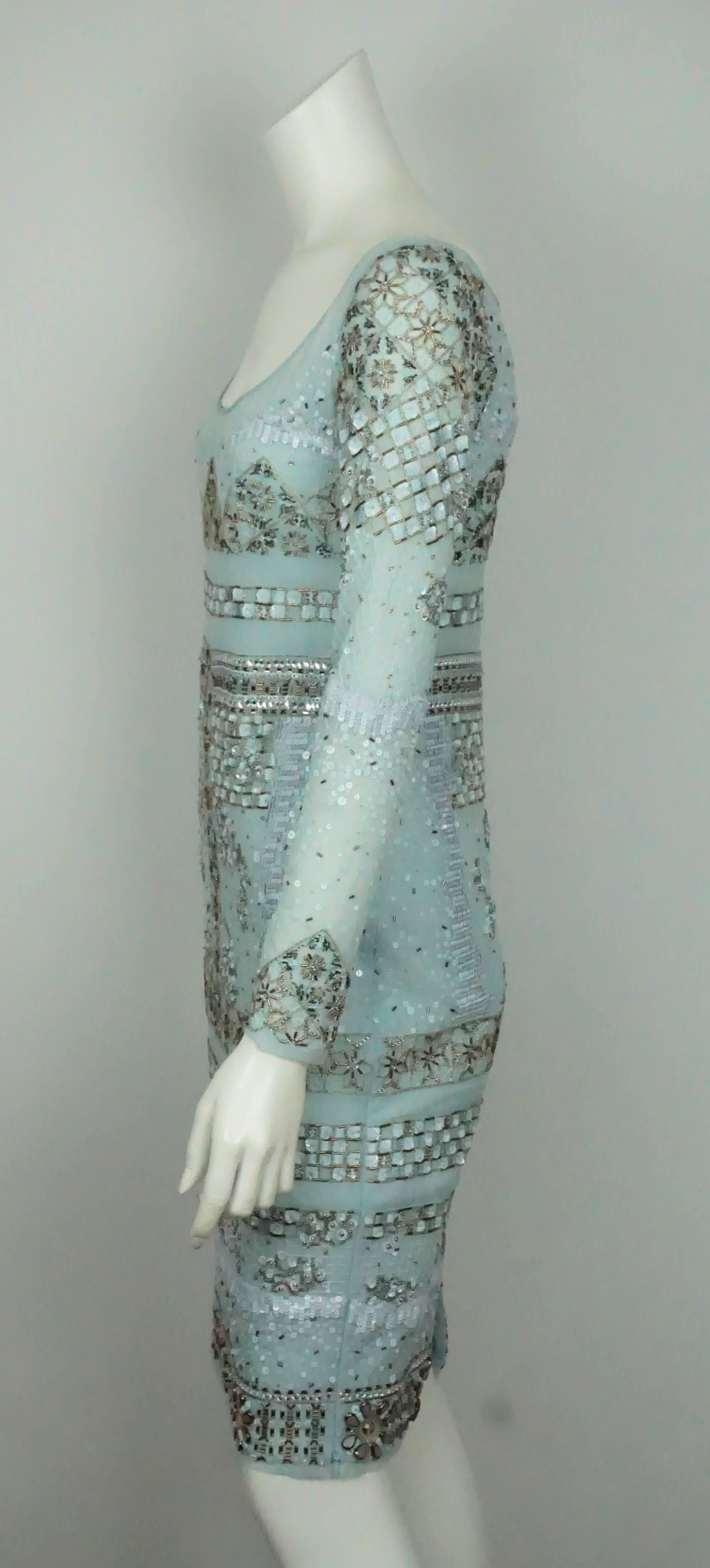 Emilio Pucci Aqua Silk Chiffon Fully Beaded Dress - 6  This striking Pucci dress is in excellent condition. It is made out of silk and polyester. It is fully lined. The dress is covered in bugle beads, sequins, rhinestones, pearls, and silk