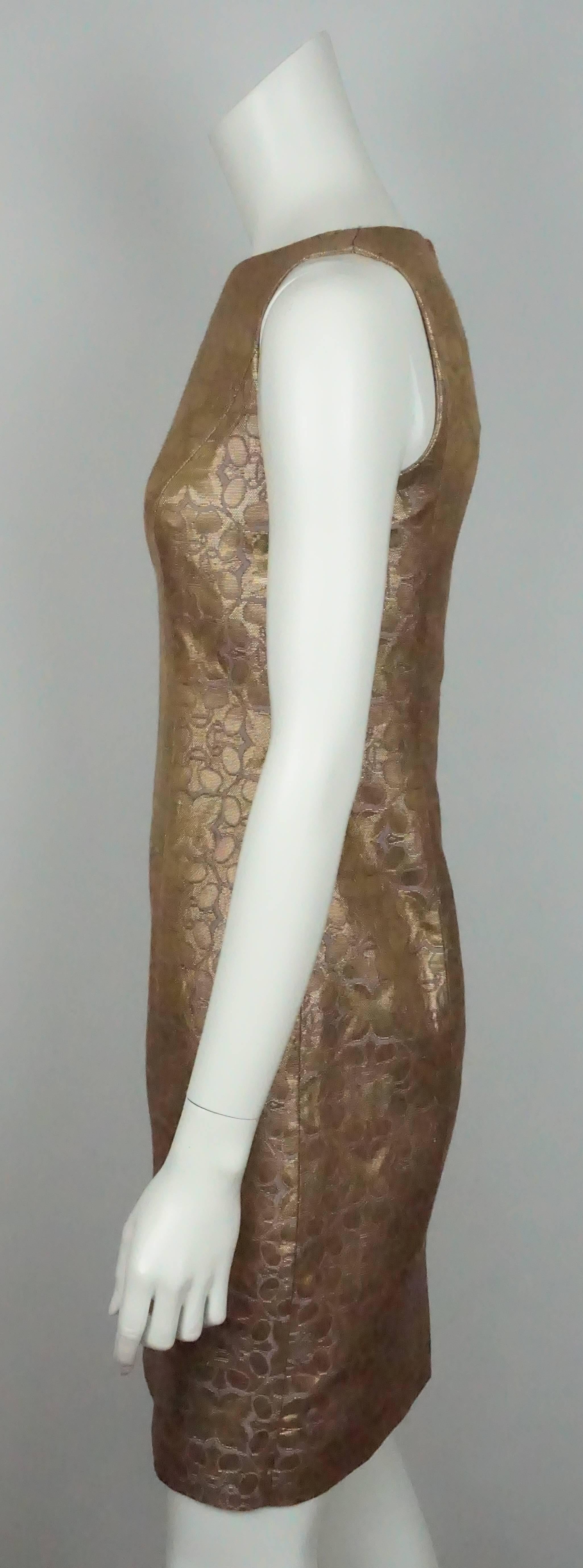 Carolina Herrera Gold and Purple Brocade Dress - 4  This exotic looking dress is in excellent condition. The dress is sleeveless and is completely gold metallic. There are some peeks of lavender around the pattern of the dress. It has a geometric