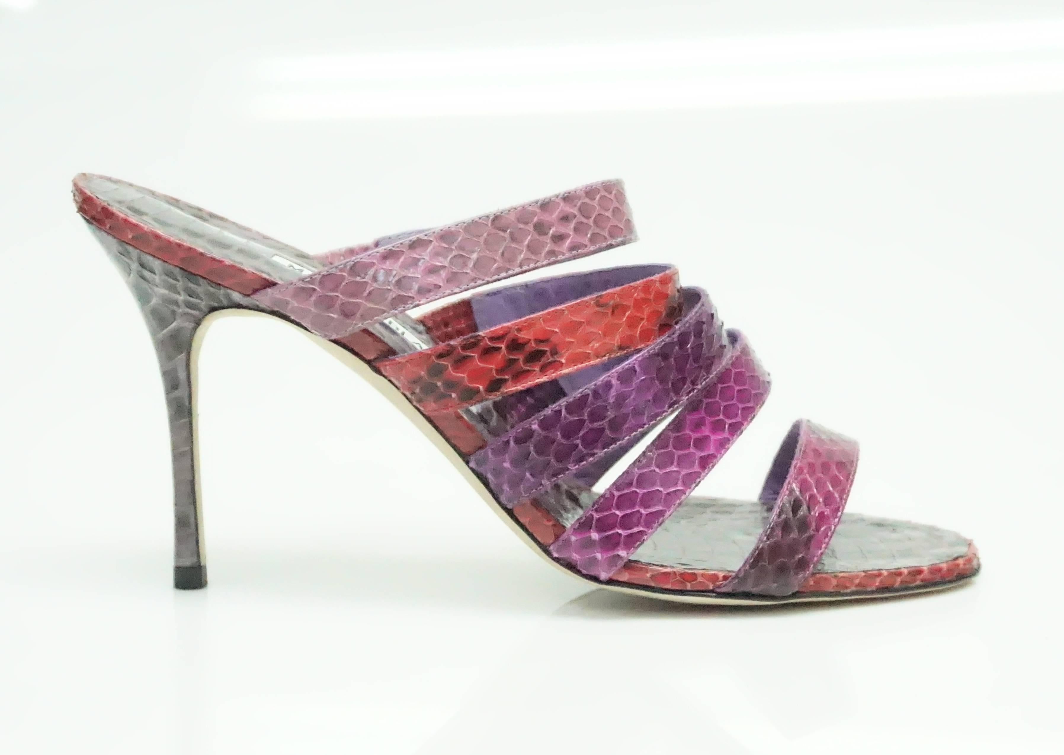 Manolo Blahnik Purple & Red Strappy Python Sandal - 38 - NEW/NEVER WORN  These striking python shoes have never been worn before. They have an open heel and just have five straps across. The colors consist of purples and pinks. 
Measurements
Heel: 4