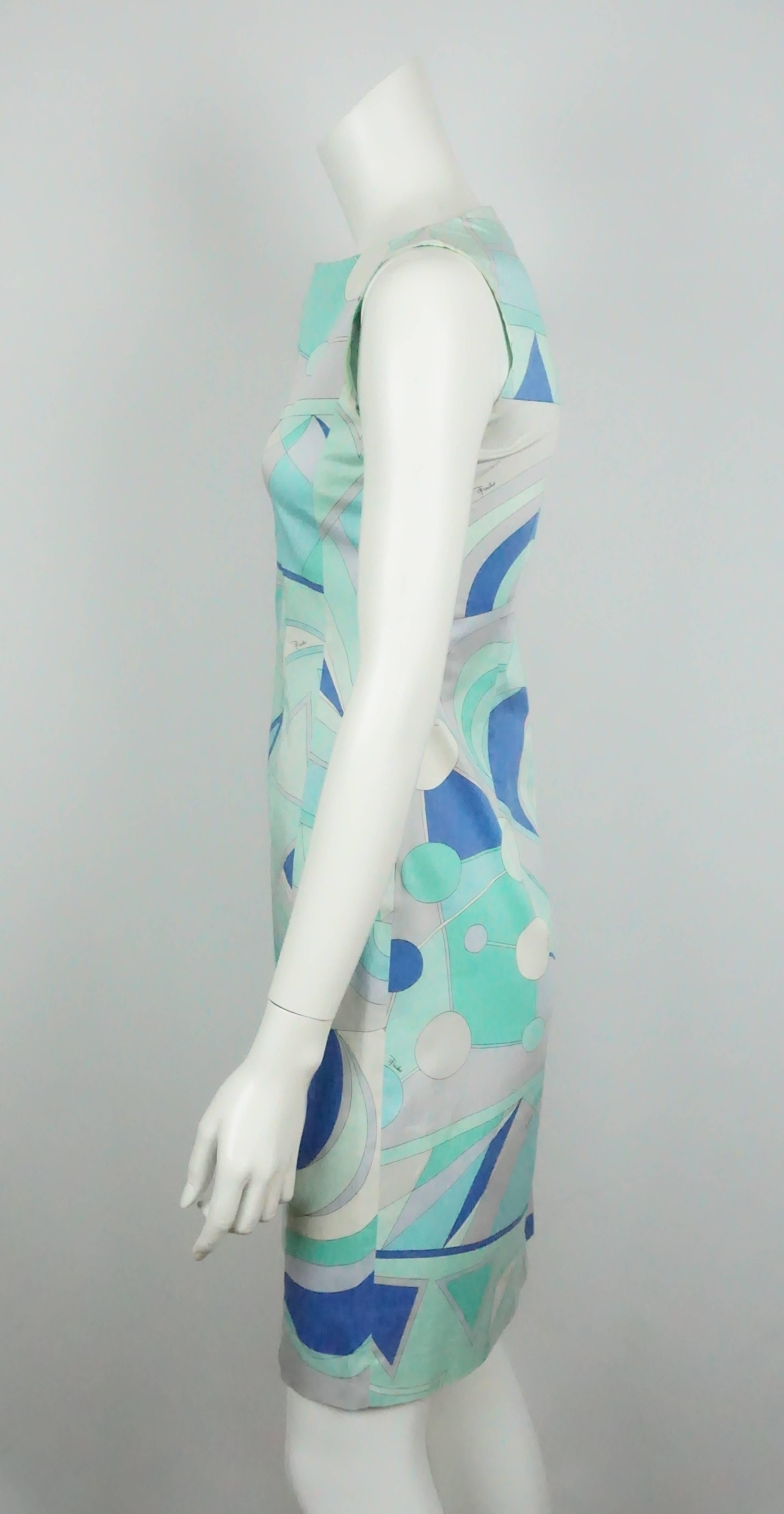 Emilio Pucci Blue & Aqua Cotton Print Dress - 38 F - 6 US  This pretty cotton and spandex blend pucci dress has a beautiful blue and aqua print and a side zip. The dress is in very good condition.
Measurements:
Bust 32