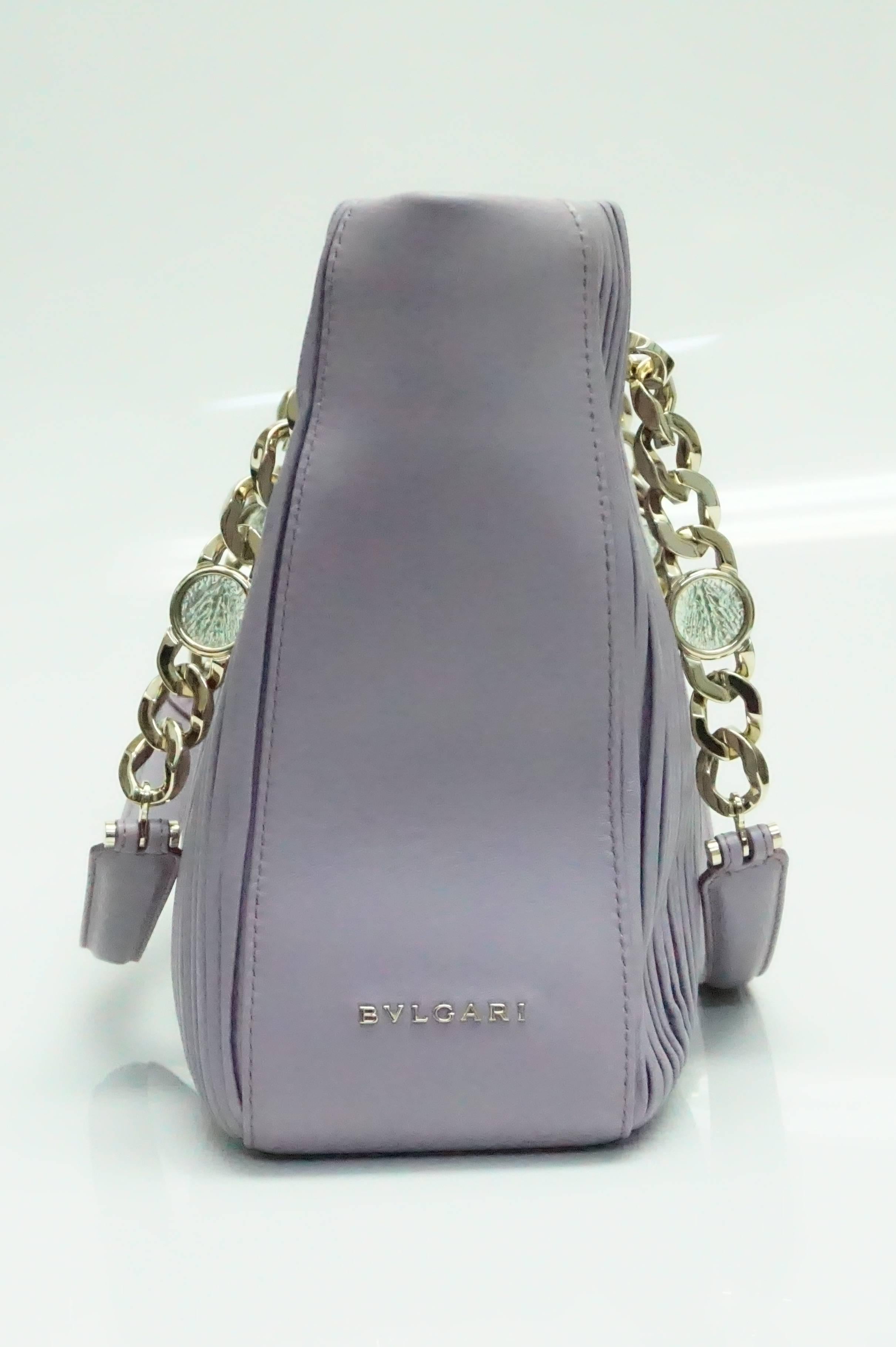 Bvlgari Lavender Monte Plisse Tote - SHW  This elegant and unusual leather bag is in excellent condition. The bag has inverted pleats on the front and back. The handles are silver chain linked with a glass looking detail in between and meets in the