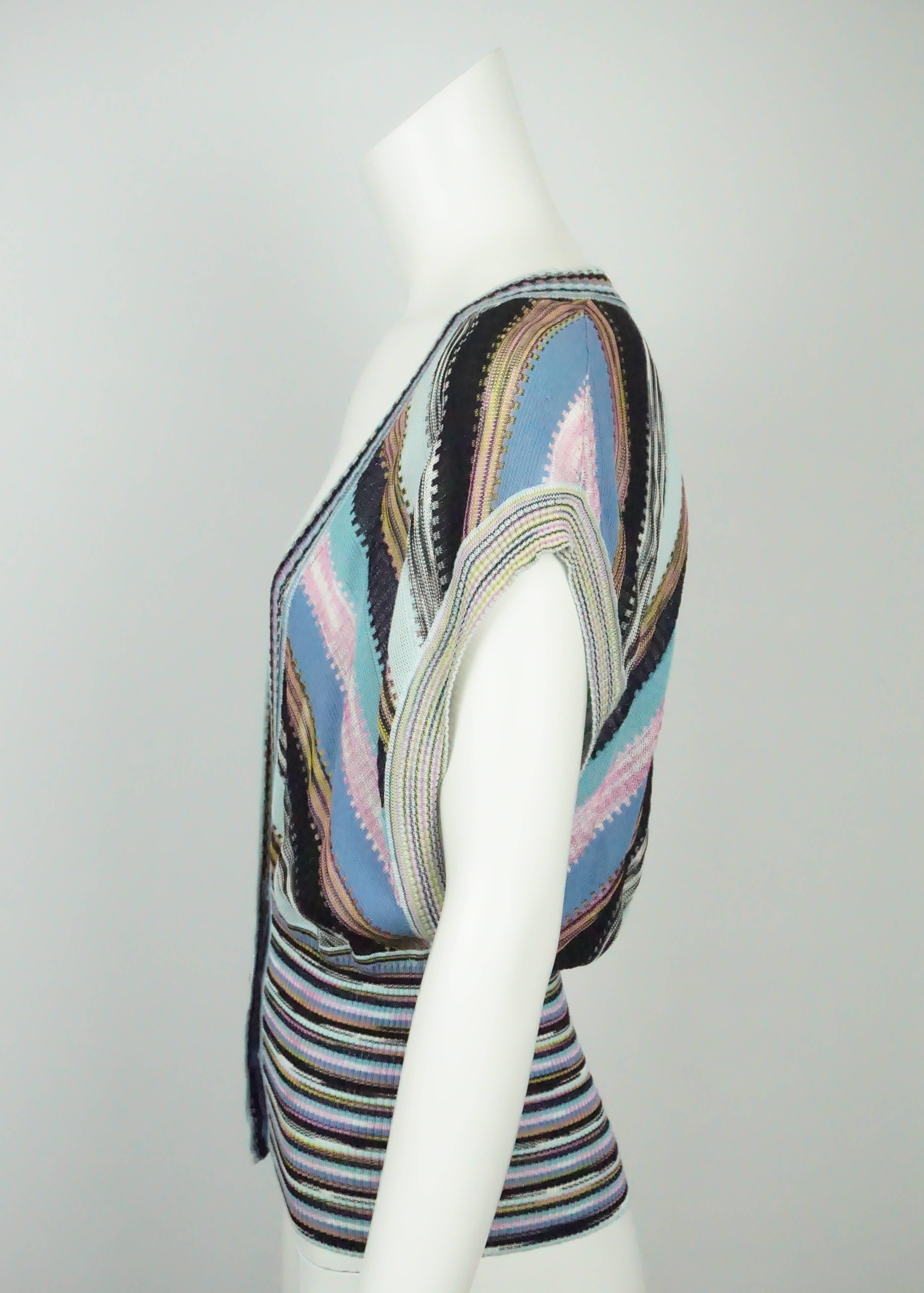 M Missoni Multi Knit V Neck Sleeveless Top - 42 This colorful Missoni top is in excellent condition. The top has stripes of navy blue metallic, pink , Blue, Mint, yellow, and black/white. There is a slight cap sleeve and the sides of the top are