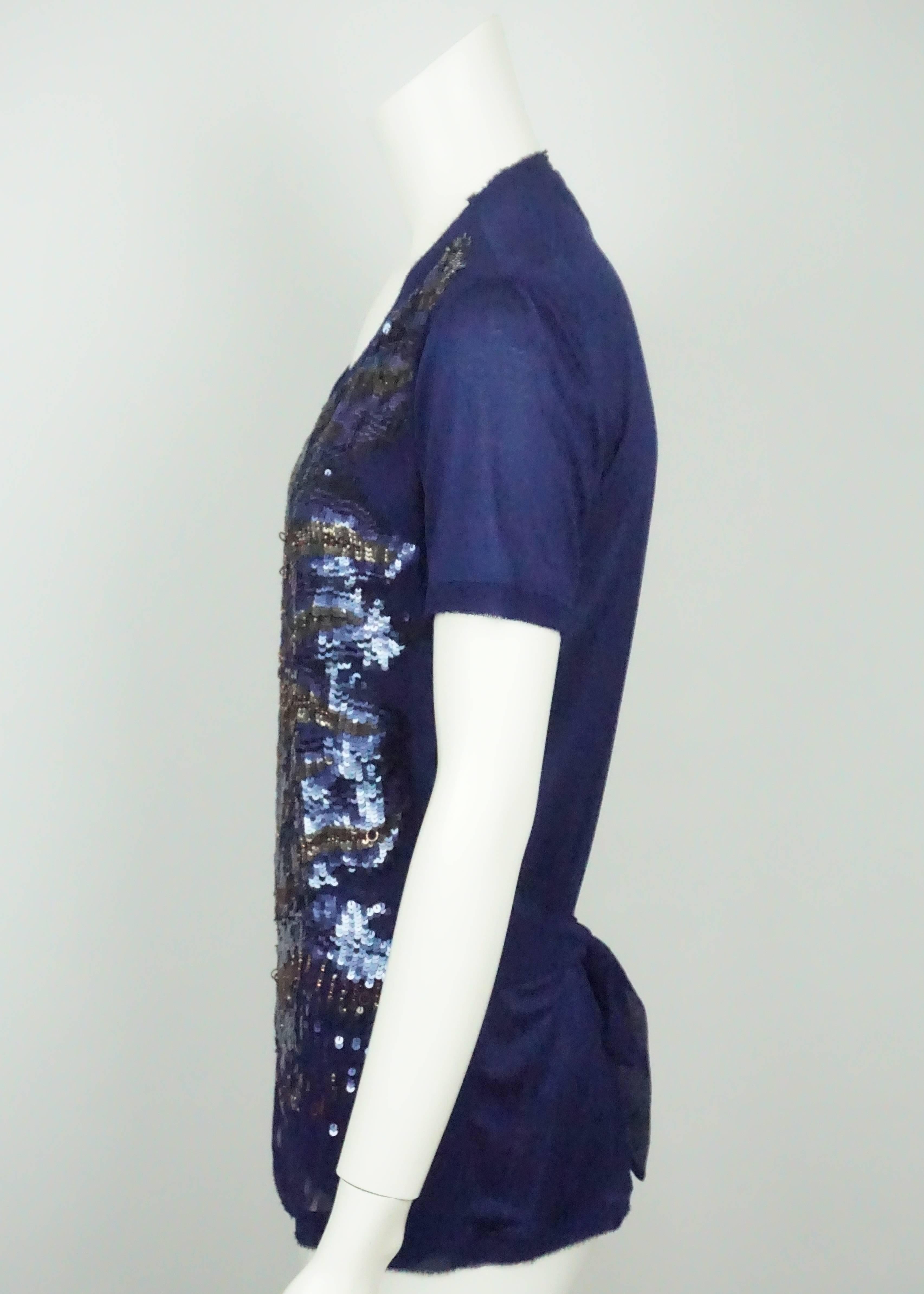 Roberto Cavalli Blue Silk S/S w/ Sequin - 6  This stunning Cavalli poly-blend top is in excellent condition. The front and the back fabrics of the top are completely different. The front has a double layer of chiffon and the back is a stretchable
