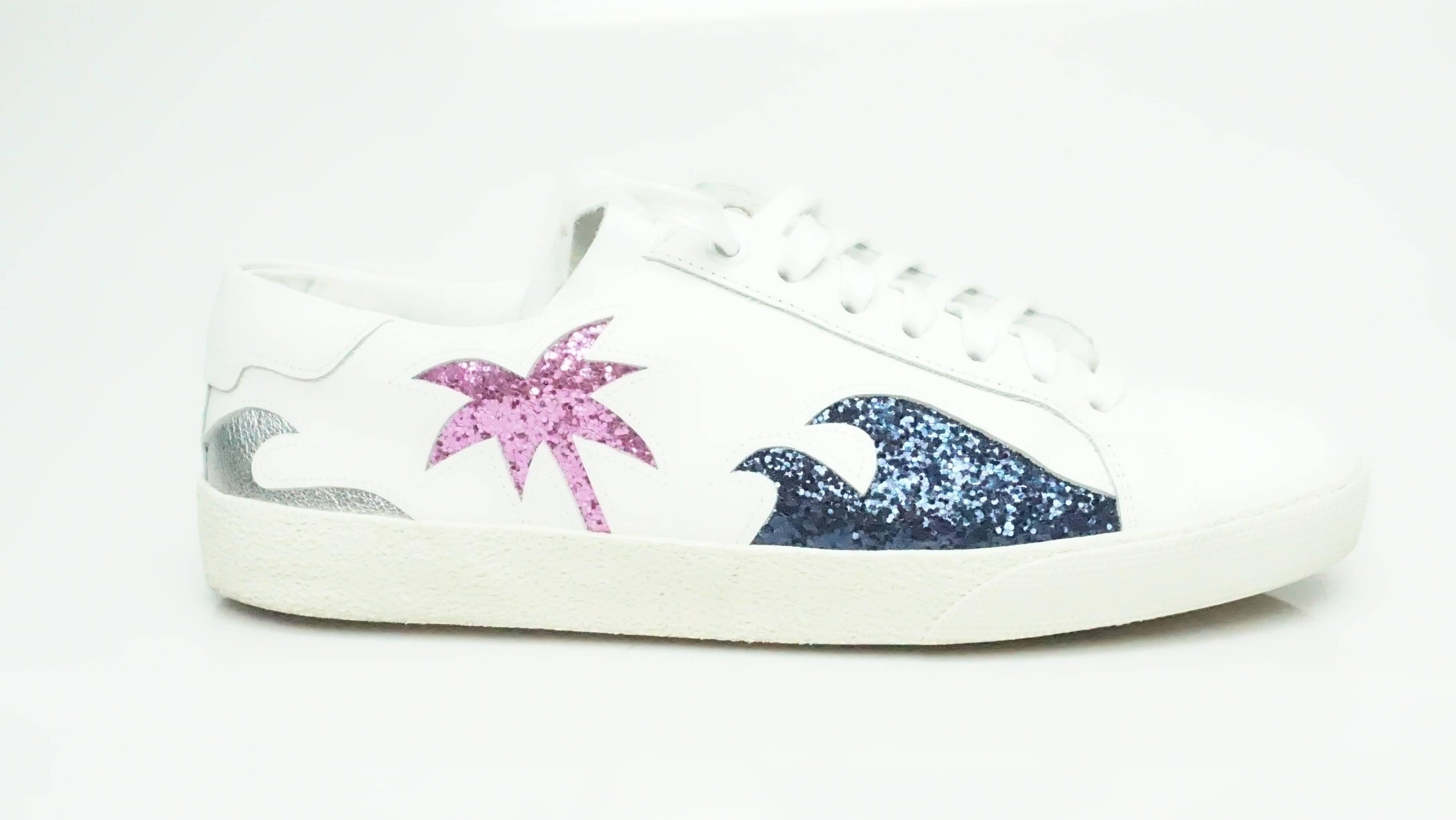 Saint Laurent White Sneaker w/ Sequin Detail - 37  These fun sequin shoes have never been used before. They come with their own box and duster. On the sides of the shoe there is a navy blue wave, a magenta palm tree and a gold star on the other