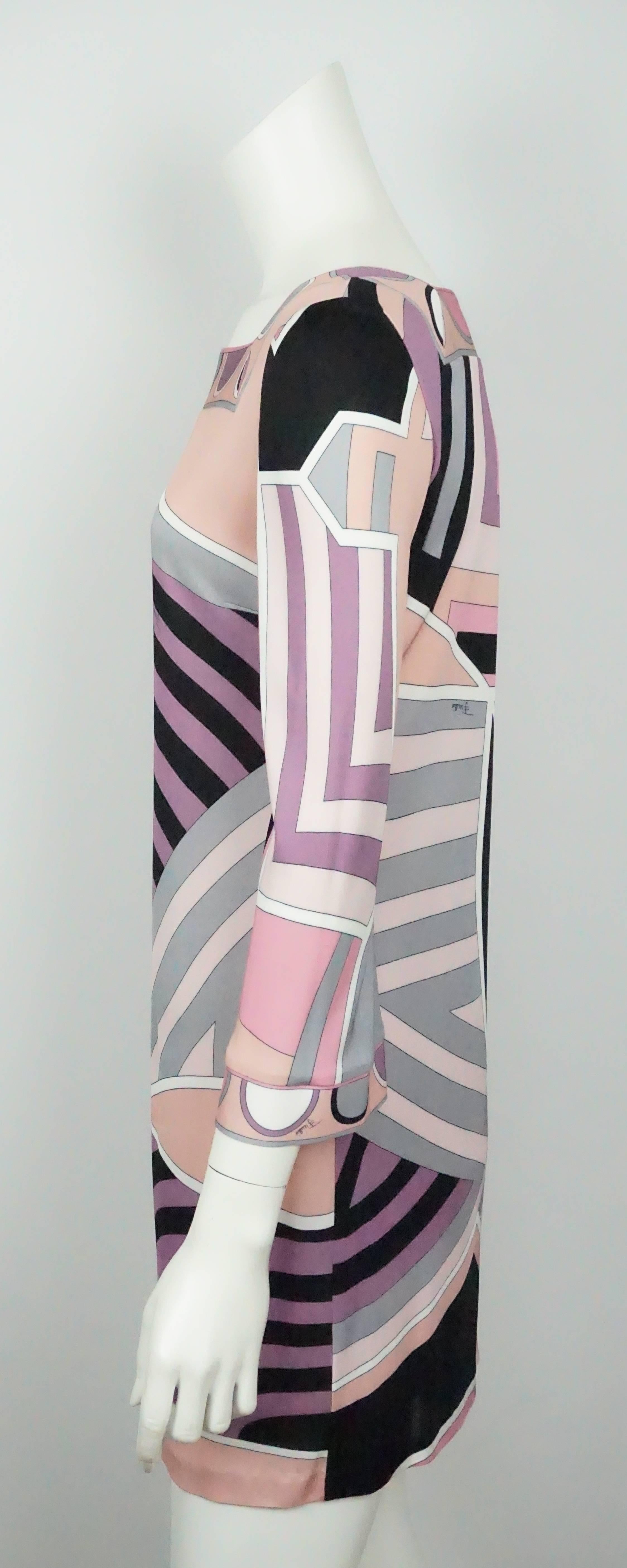 Emilio Pucci Pink, Black, and Earthtones Printed L/S Dress - 6   This beautiful printed viscose dress is in excellent condition. The dress starts off with a square neck and has a circle pattern around it. The cuffs of the sleeves are slightly wider