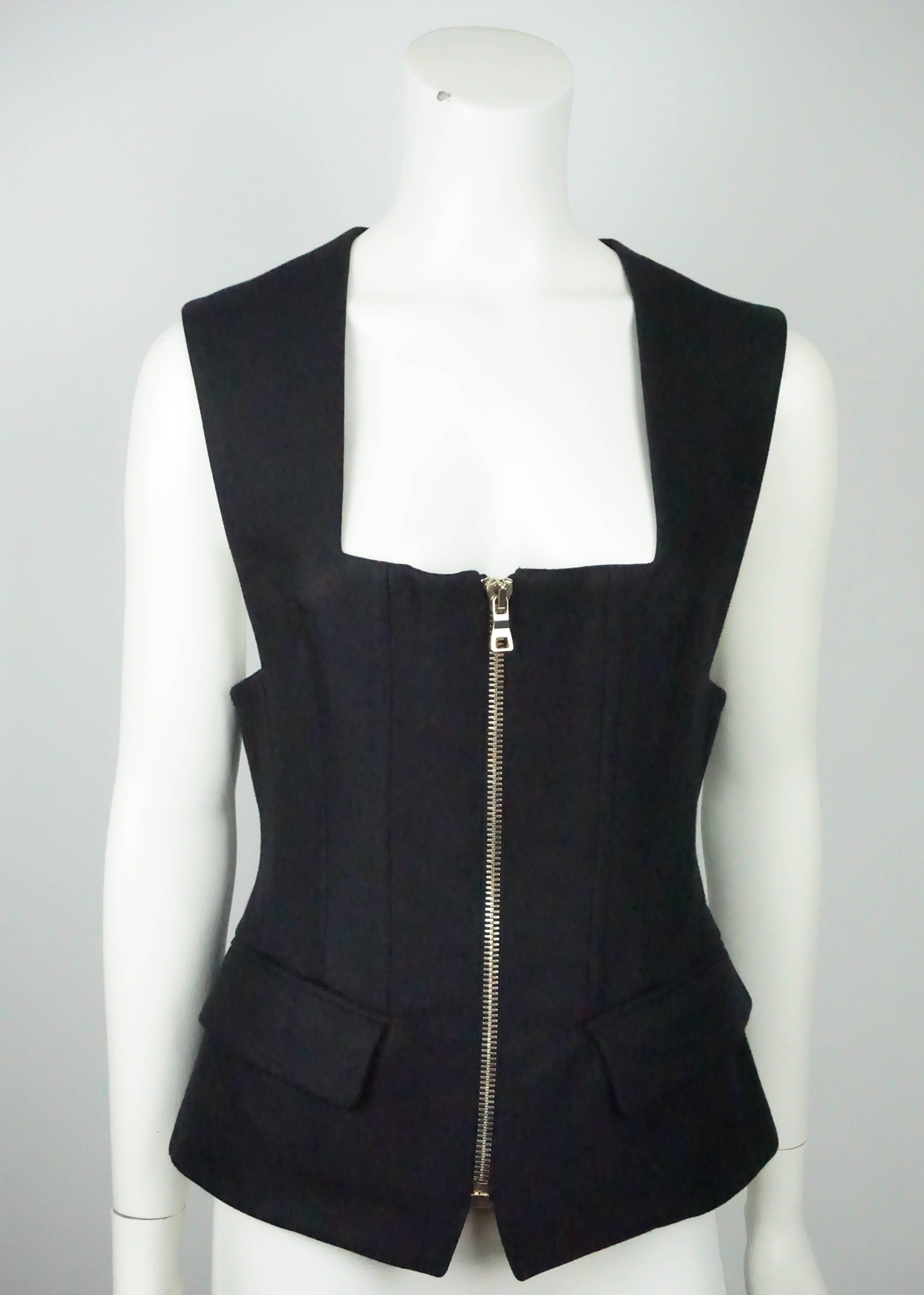 Balmain Black Sleeveless Silk Blended Vest Top - 40  This unique top is in excellent condition. The top is built like a bustier because it has bones on the entire body of the top. There is a gold separating zipper going down the front. There are two