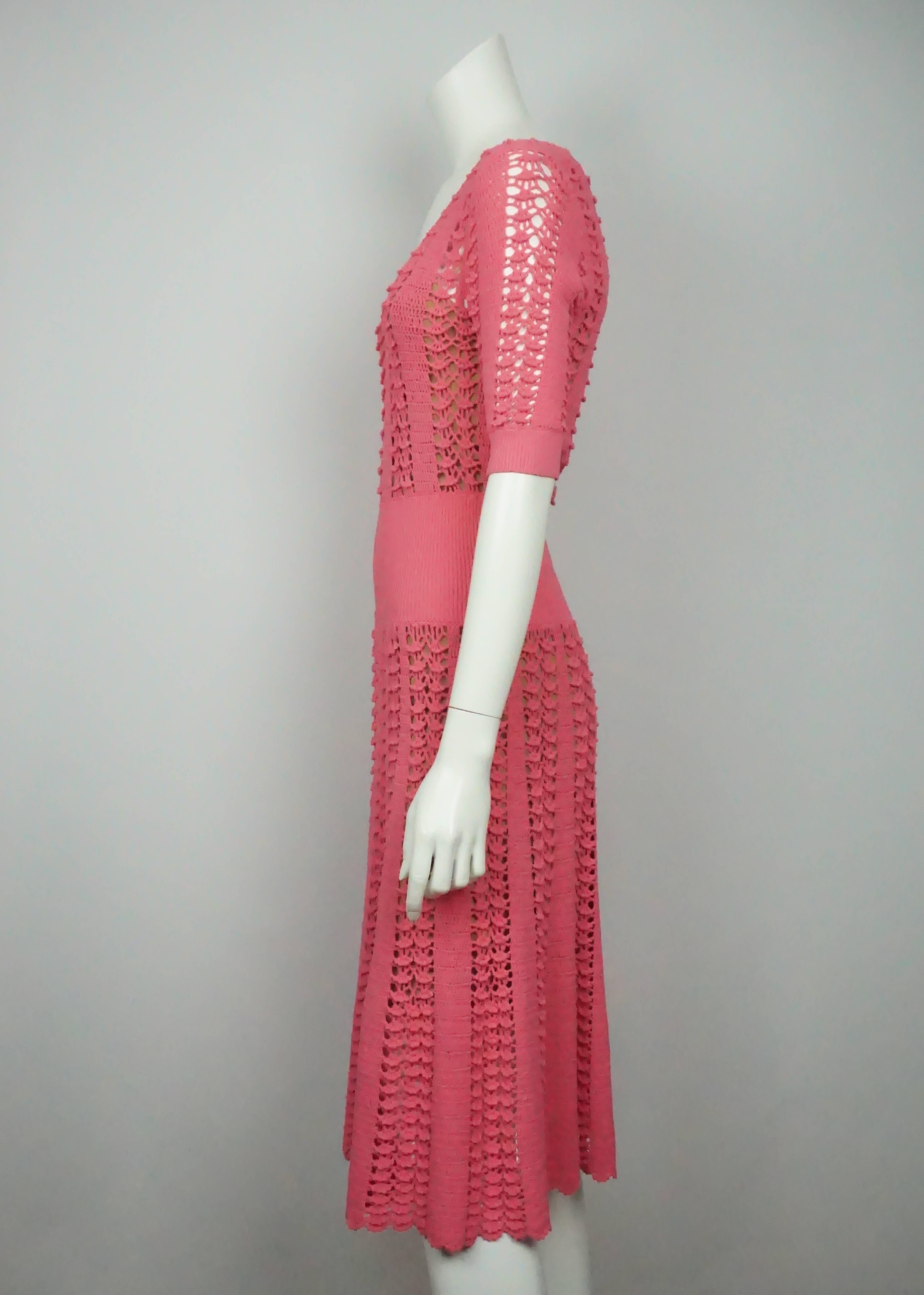 Michael Kors Pink Knit Dress - Small  This unique dress is in excellent condition. It is made out of a viscose and polyester material. There is a nude slip underneath the dress since it has small cutouts throughout the dress. The dress has a small