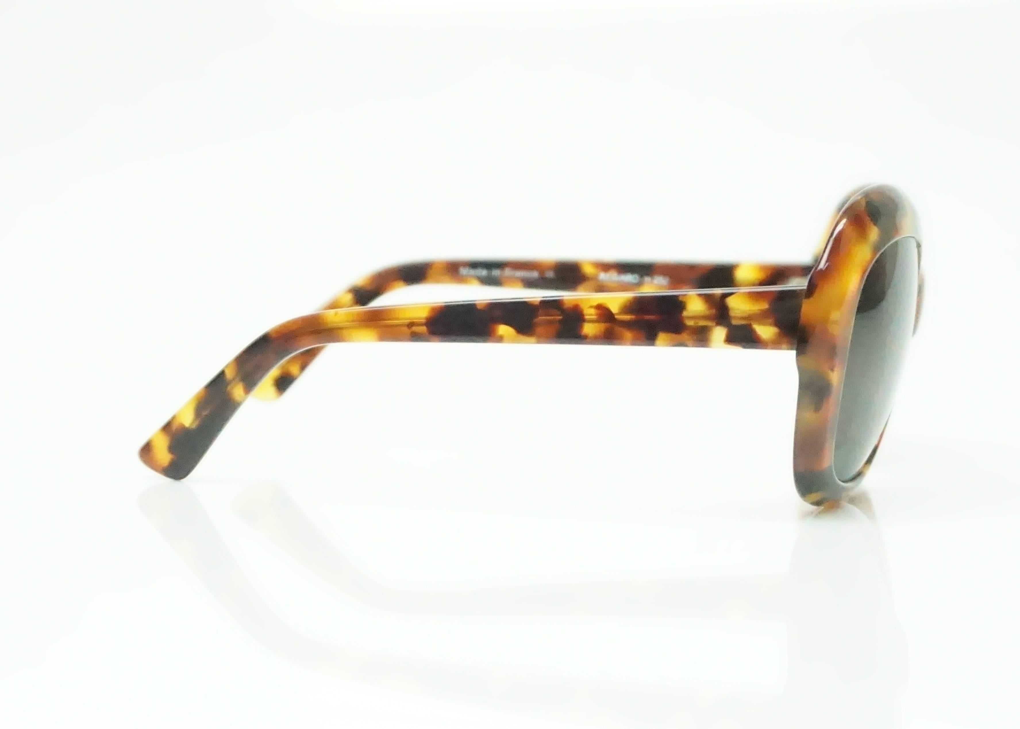 Francois Pinton Tortoise Shell Oval Sunglasses - Circa 80's  These beautiful sunglasses are in excellent condition. The shape of the glasses are in an almost oval shape and have the tortoise print carried throughout. 
Measurements
Front: 6