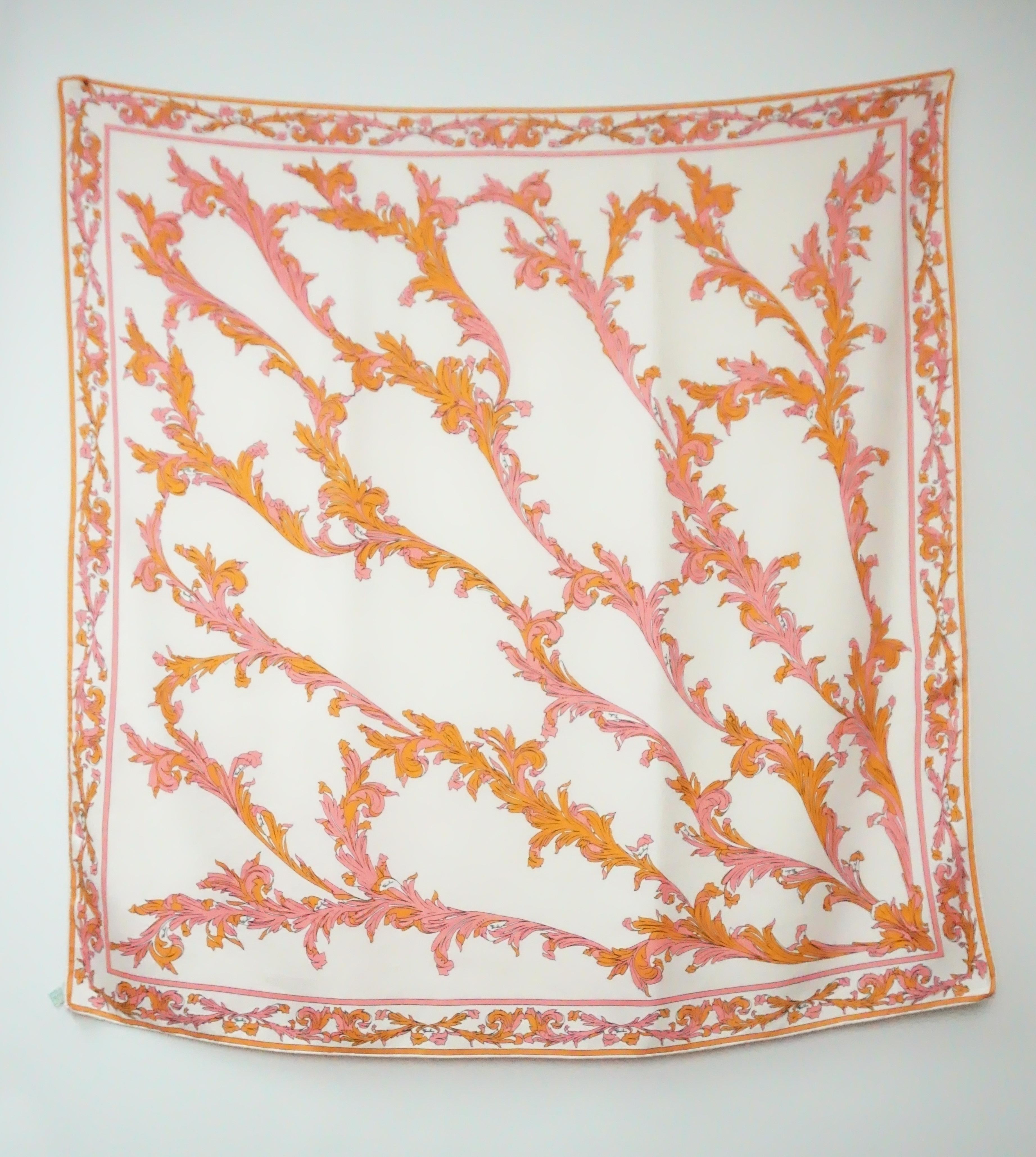 Emilio Pucci Vintage Pink and Orange Print Silk Scarf  - Circa 70's  This beautiful silk scarf is in excellent vintage condition. There is a beautiful leaf like pattern throughout the scarf that continues through the boarder. 
Measurements 
Height: