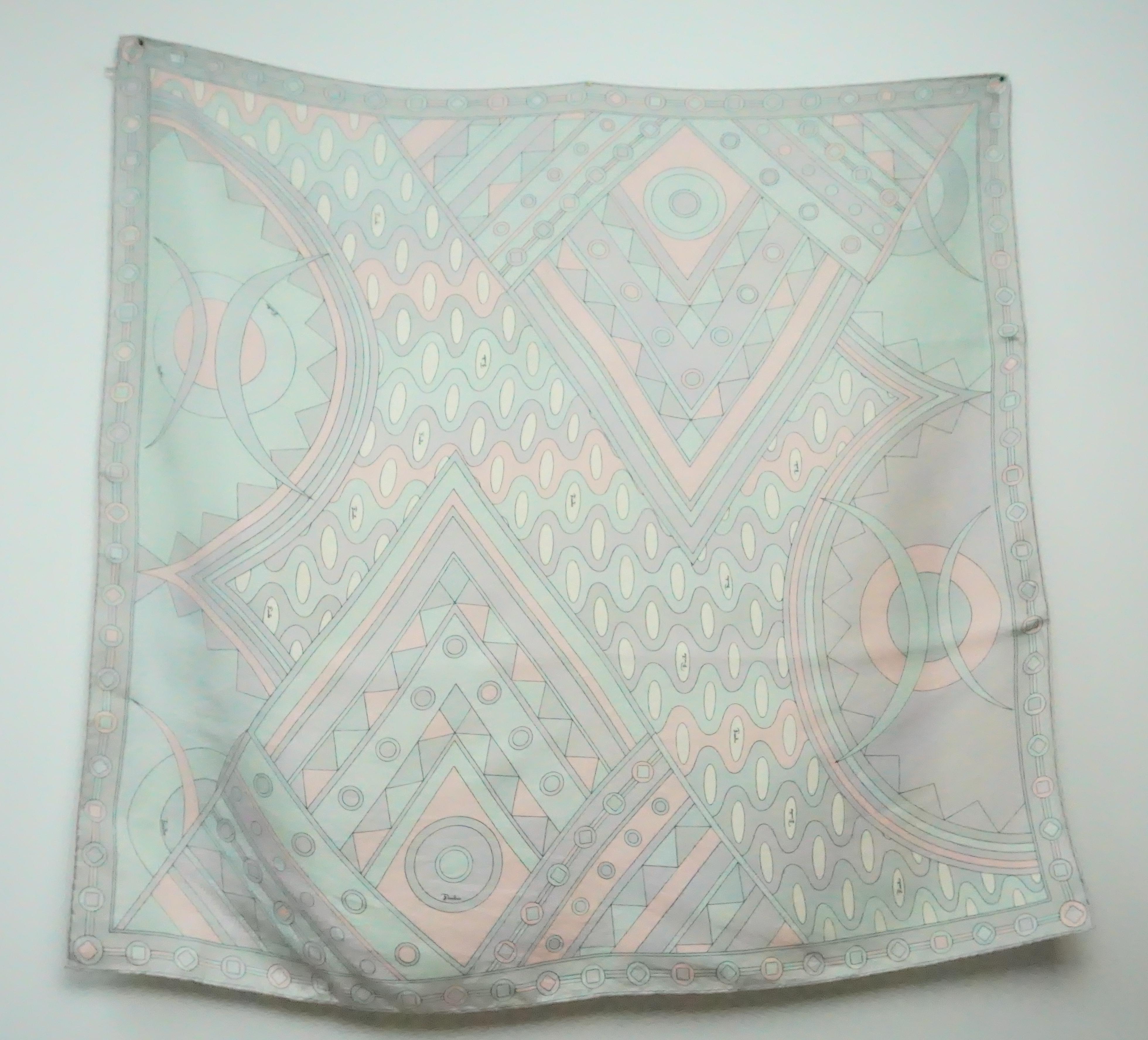 Emilio Pucci VIntage Pastel Print Silk Scarf  - Circa 60's This unique silk scarf is in good condition. The entire scarf is detailed in a unique pattern with very different shapes. 
Measurements 
Height: 33.5
