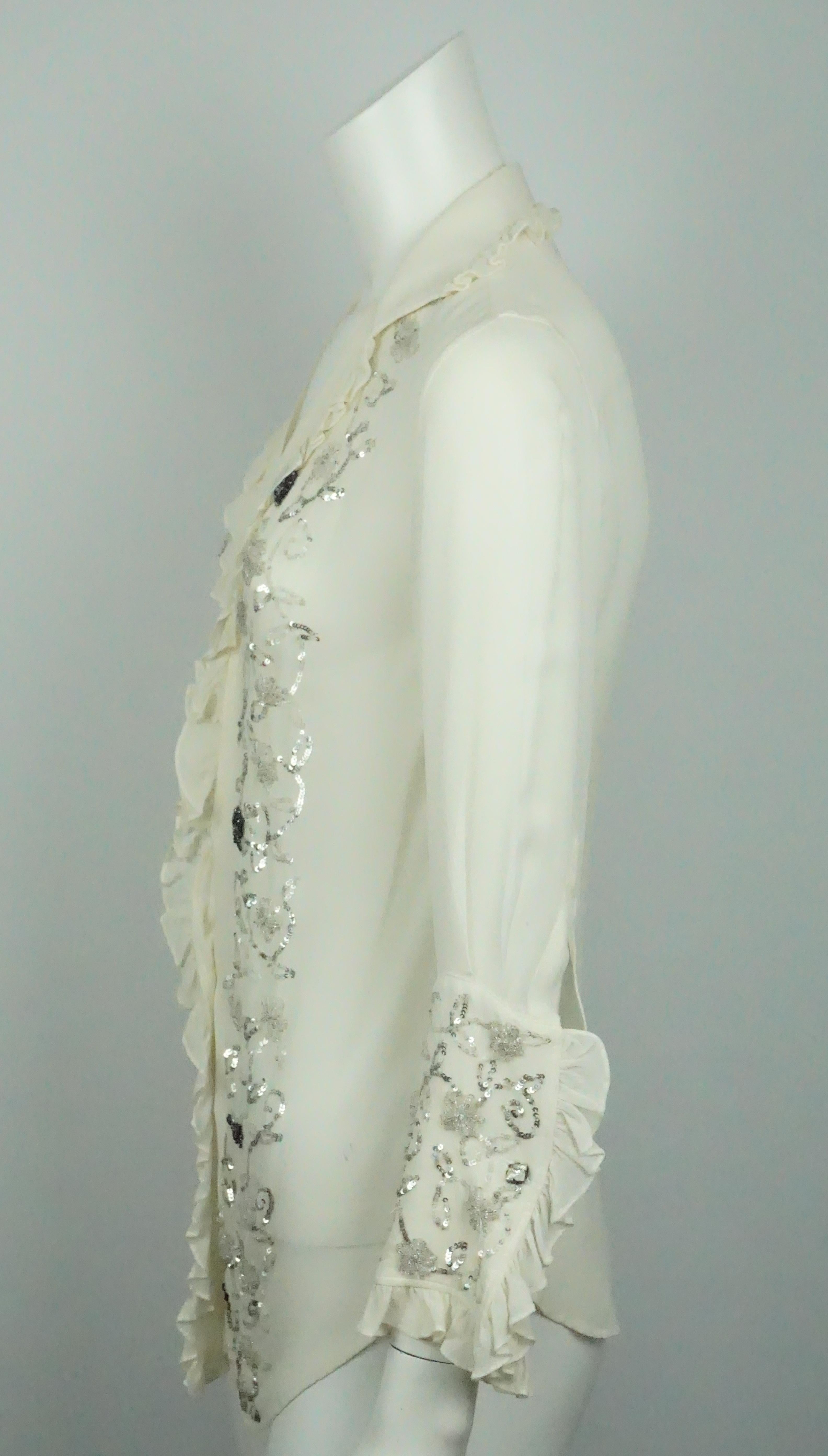 Dolce & Gabbana Ivory Silk Chiffon Top w/ Beaded Details - Medium  This gorgeous silk chiffon top is in excellent condition. There are ruffles around the collar, down the middle where the buttons are located, and around the cuffs. On the center