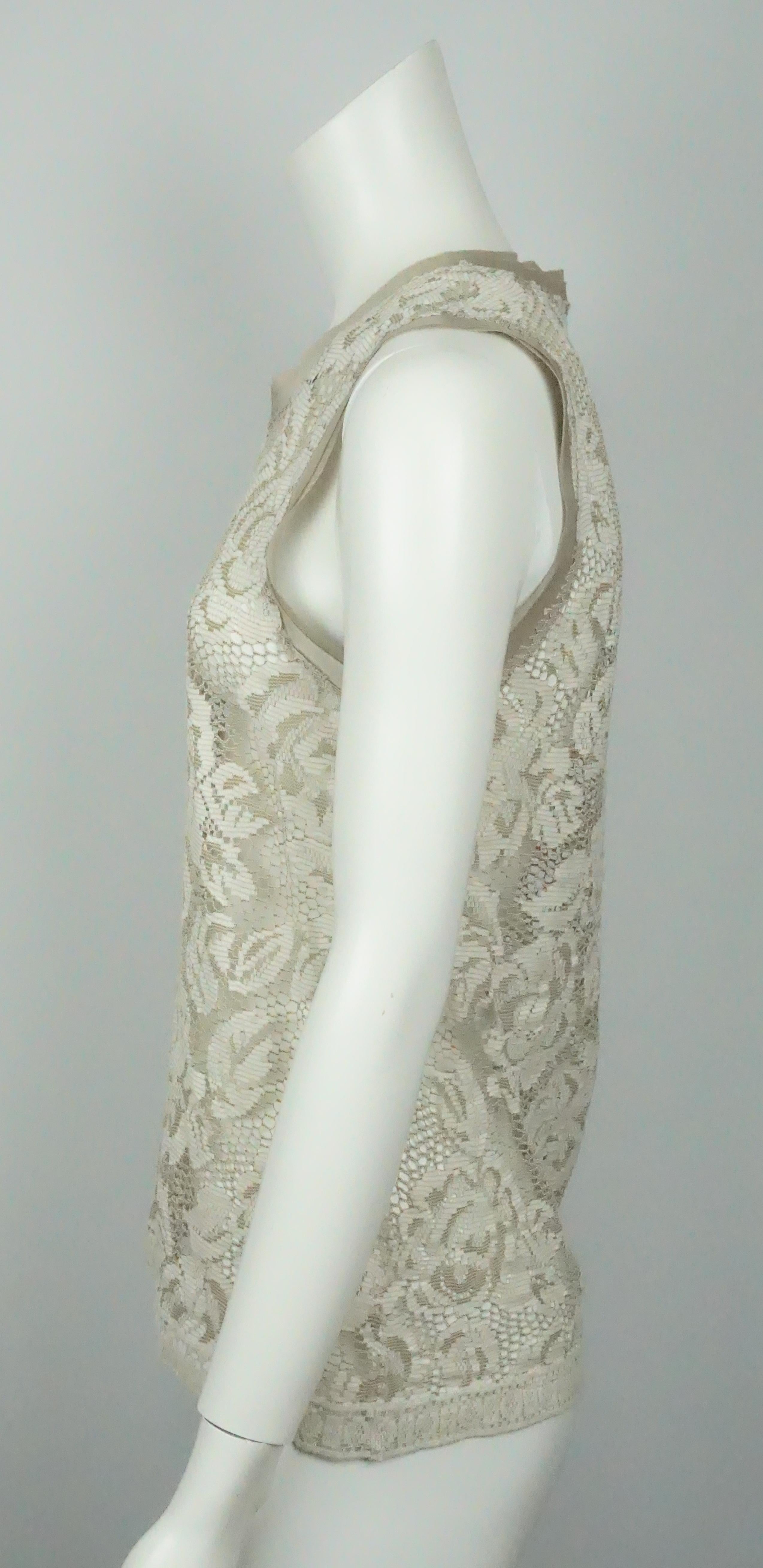 Dolce & Gabbana Taupe Sleeveless Lace Top - 42  This beautiful cotton top is in excellent condition. The top is completely sheer and has a floral and leaf design throughout. The fabric has a lace look to it. The neck hole and the arms hole are