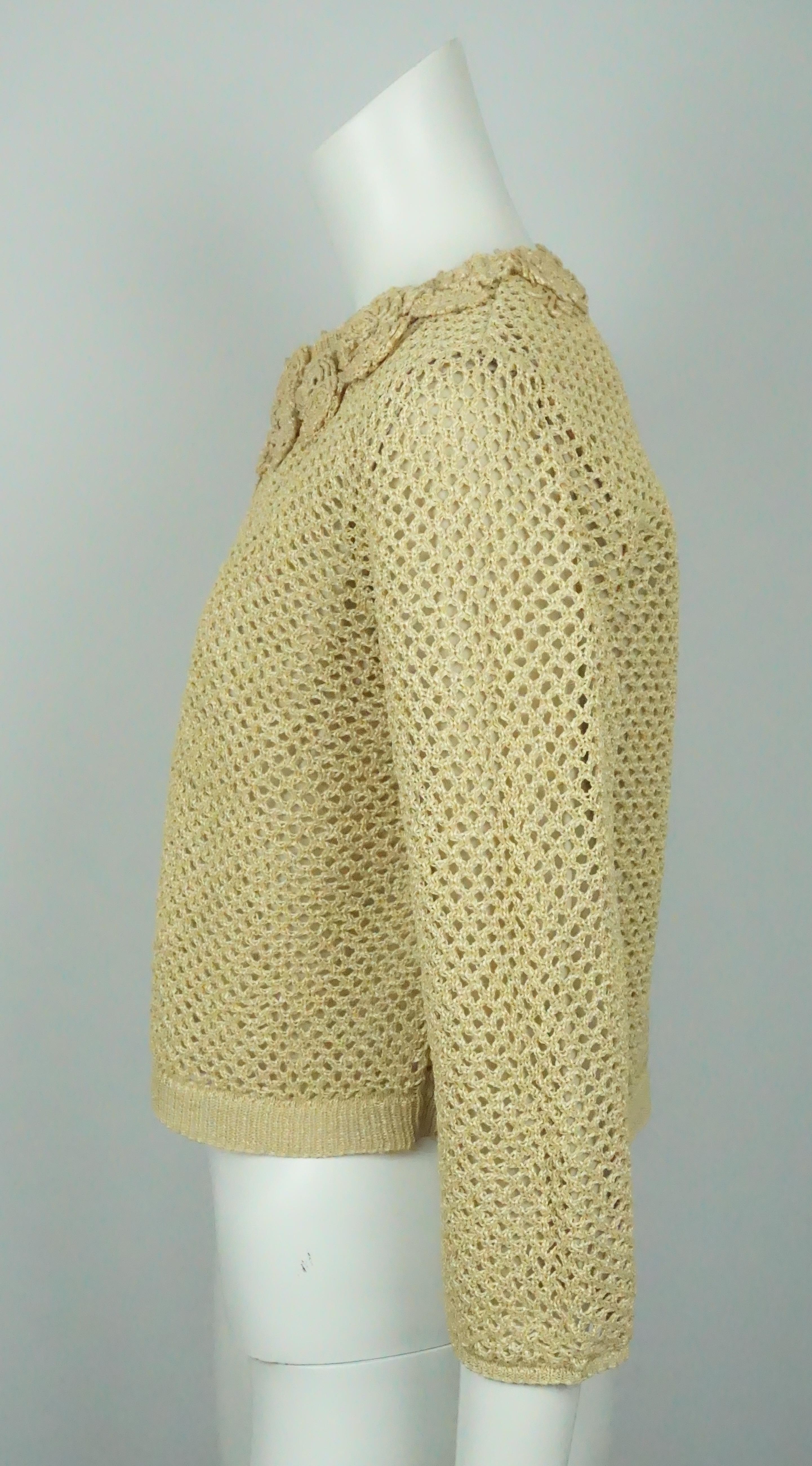 Red Valentino Beige Raffia Crochet Knit Jacket w/ Floral Detail -  Medium   This gorgeous jacket is in excellent condition. The jacket is made of modal and is lined in cotton. The exterior of the jacket has a crochet look to it and has a beautiful