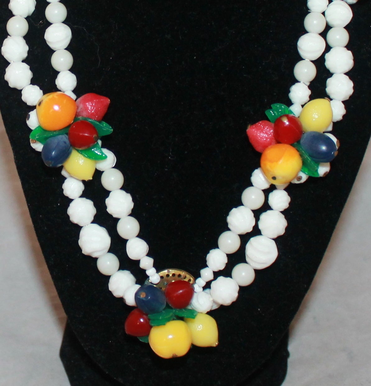 1950's Rare Vintage West German Fruit Beaded Necklace. This necklace is in excellent vintage condition with wear consistent with its age. It has a hook clasp and is signed W.Germany on that area. 

Measurements:
Length- 16.5-19