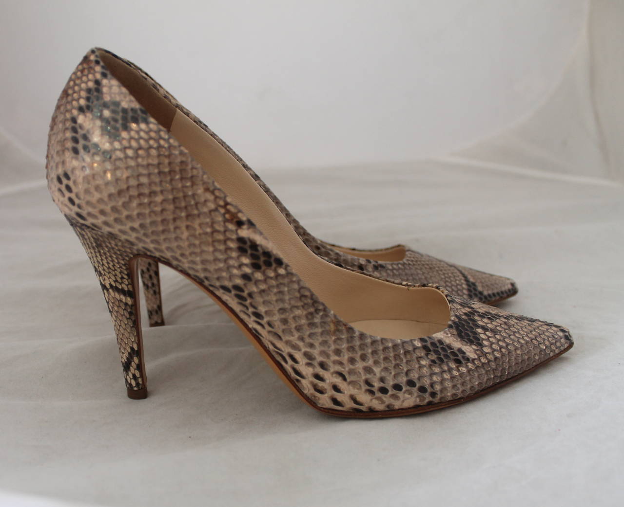 Valentino Python Pointed Toe Pumps - 36. These shoes are in very good condition with minor wear on the bottom.