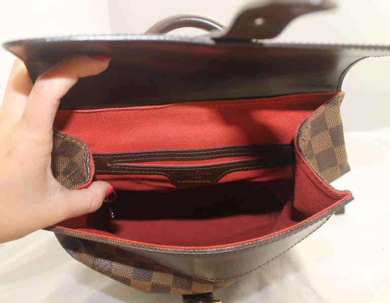 Louis Vuitton Brown Damier Backpack - Circa 2001  Backpack is in great condition.

Height- 12.5