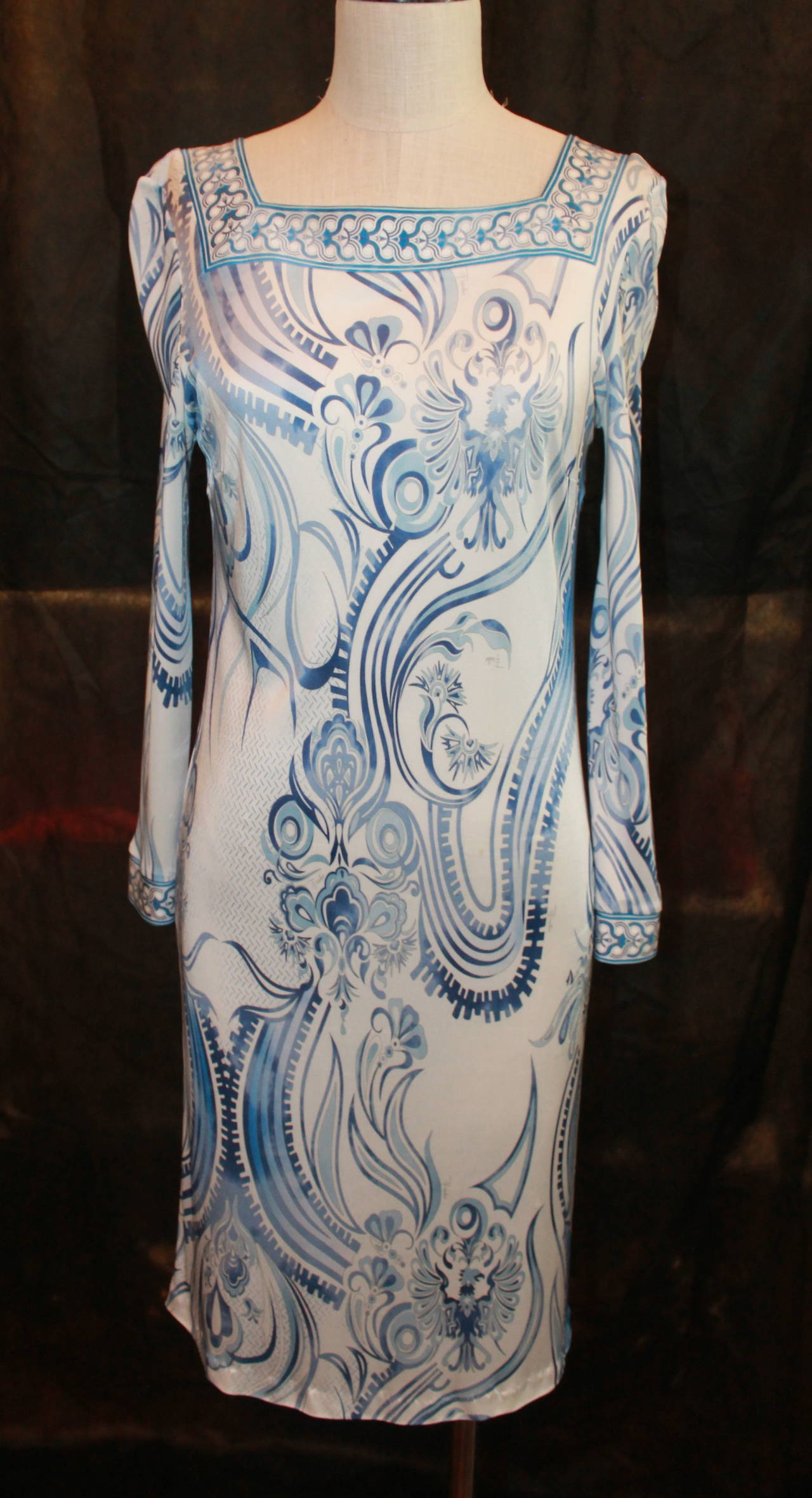 Emilio Pucci White & Blue Printed Long-Sleeve Jersey Dress - 46. This dress is in good condition and only has 1 small stain on the front pictured on image 5. 

Measurements:
Bust/Waist/Hips- 34