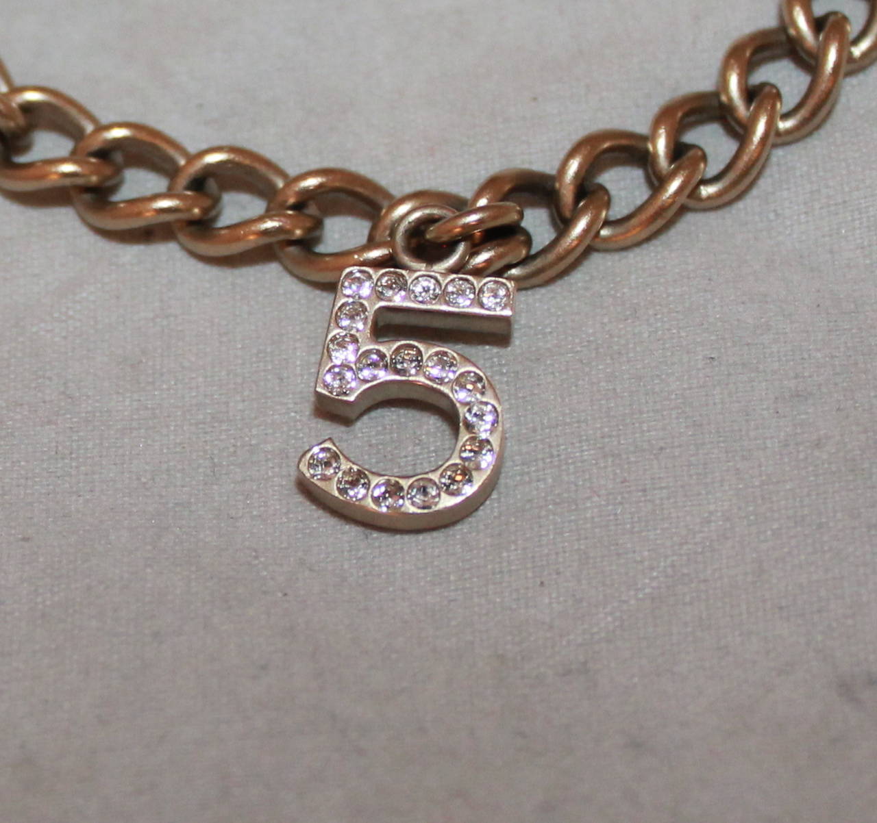 Chanel 2005 Pale Goldtone 5-Charm Rhinestone Bracelet