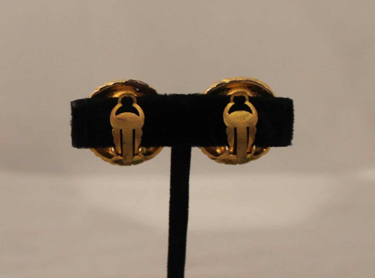 Chanel 1970's Vinatge Rhinestone & Goldtone Swirl Clip-On Earrings In Fair Condition In West Palm Beach, FL